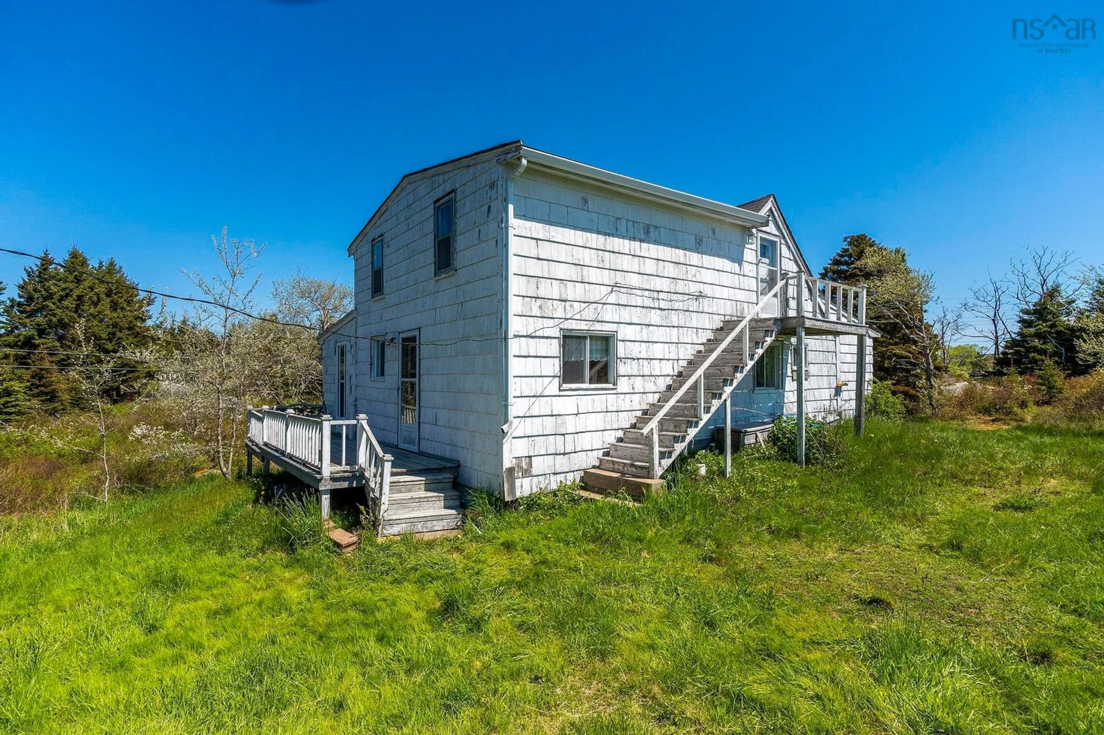 A pic from outside/outdoor area/front of a property/back of a property/a pic from drone, building for 43 South Point Rd, Portuguese Cove Nova Scotia B3V 1K3