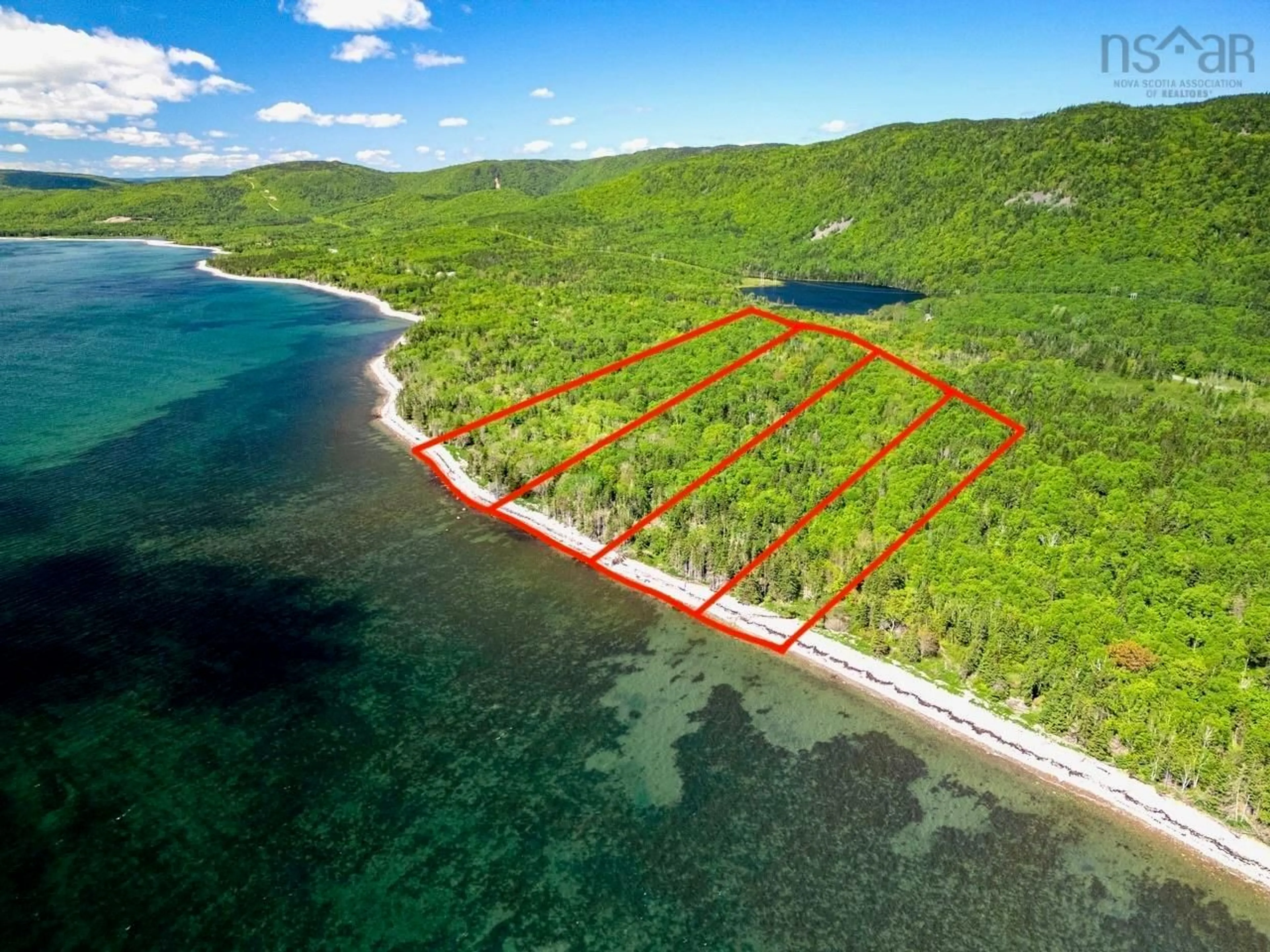 A pic from outside/outdoor area/front of a property/back of a property/a pic from drone, water/lake/river/ocean view for Cabot Trail #1-24, Indian Brook Nova Scotia B0C 1H0