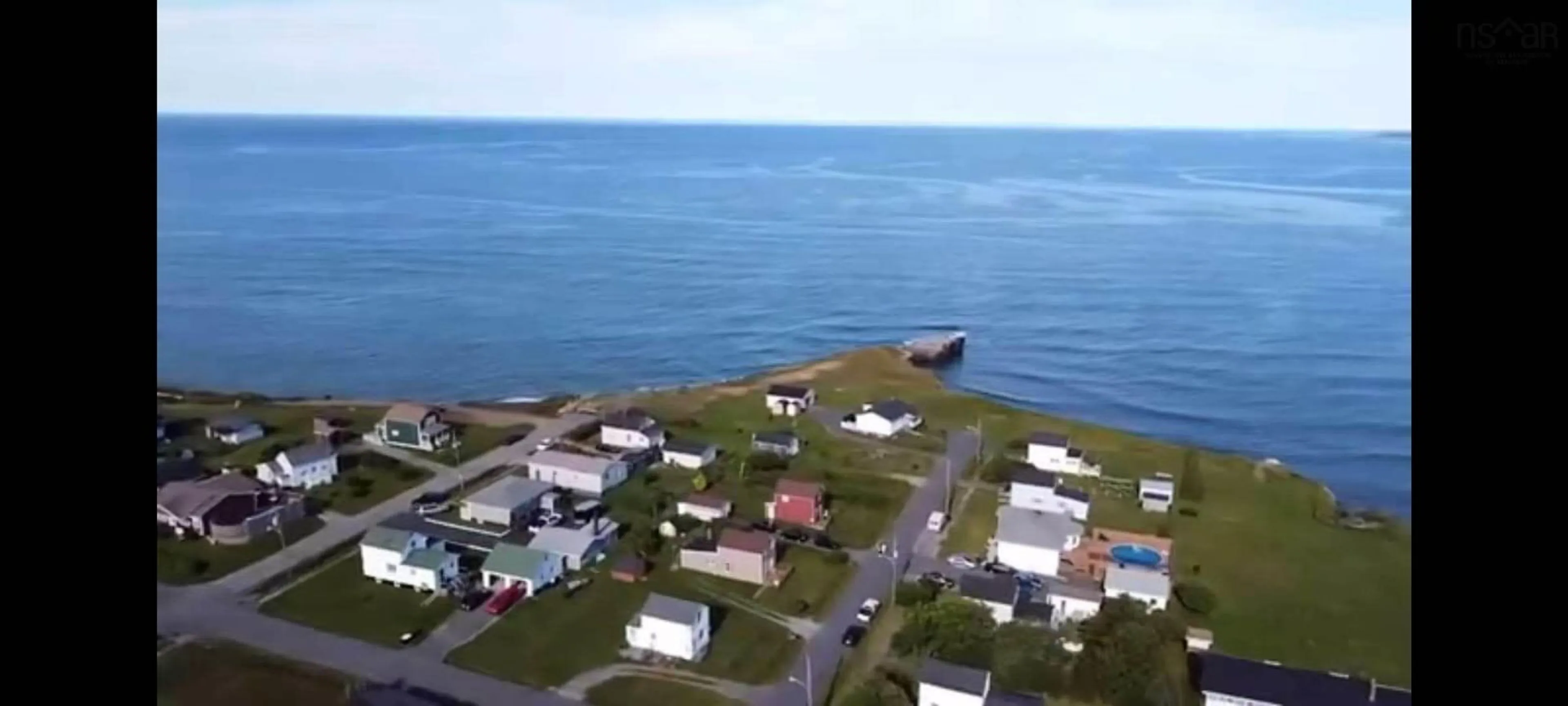 A pic from outside/outdoor area/front of a property/back of a property/a pic from drone, water/lake/river/ocean view for 33 Howe St, Glace Bay Nova Scotia B1A 5K4