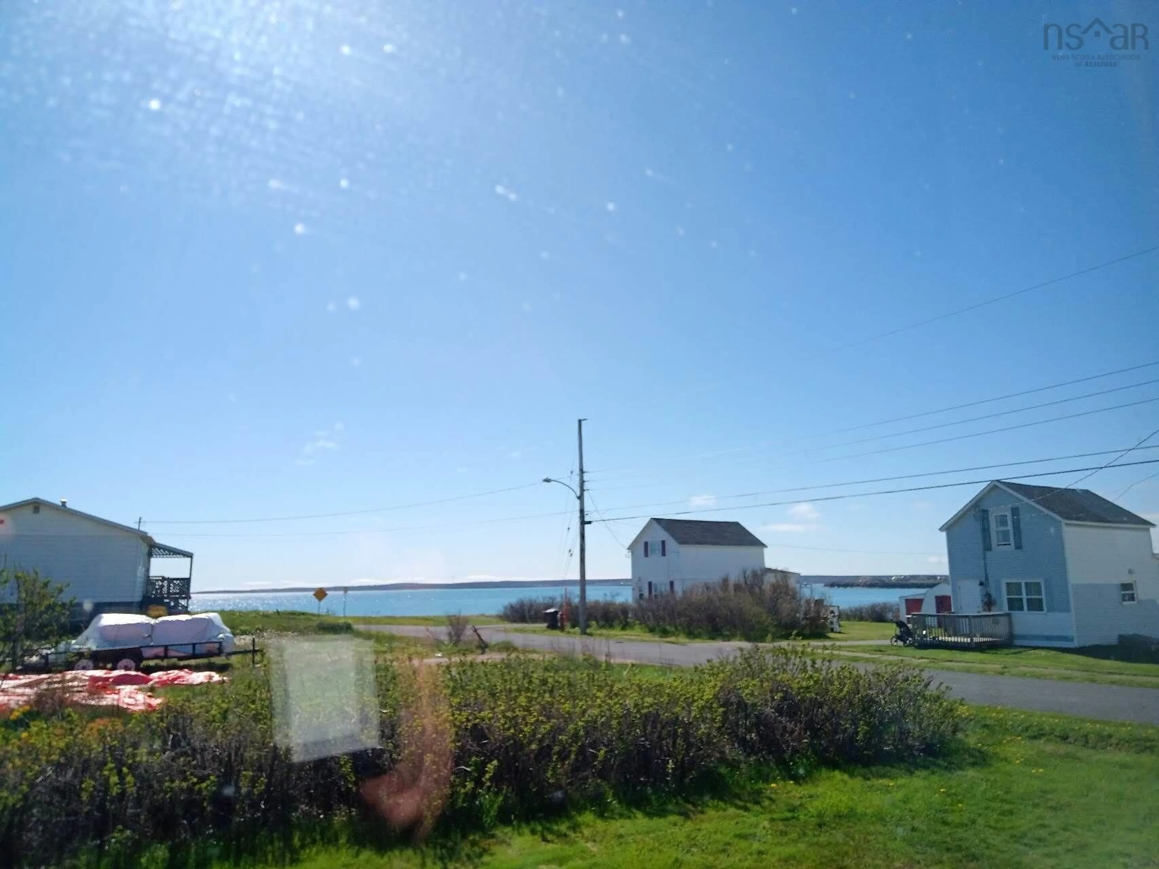 A pic from outside/outdoor area/front of a property/back of a property/a pic from drone, water/lake/river/ocean view for 33 Howe St, Glace Bay Nova Scotia B1A 5K4