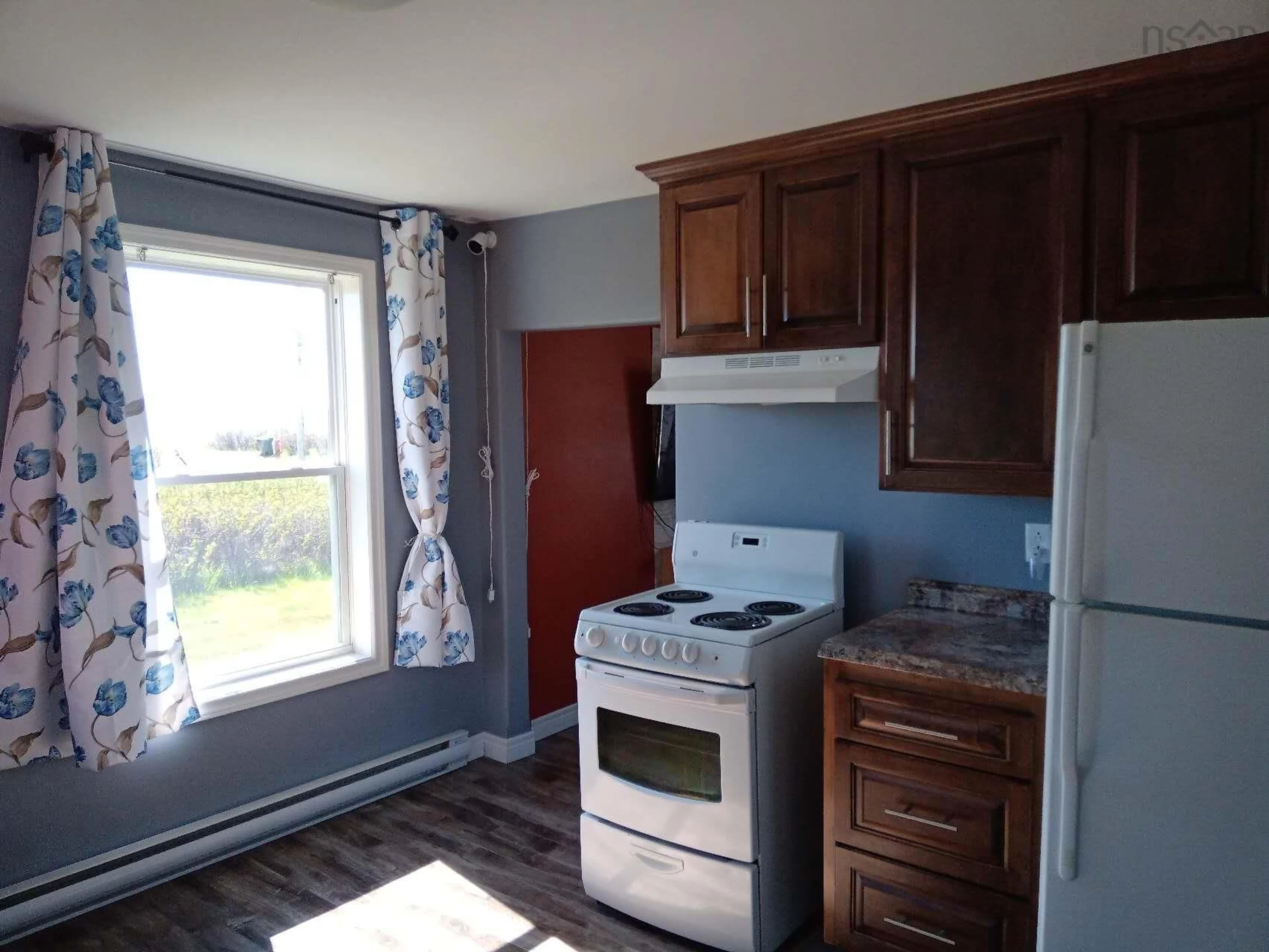 Standard kitchen, wood/laminate floor for 33 Howe St, Glace Bay Nova Scotia B1A 5K4