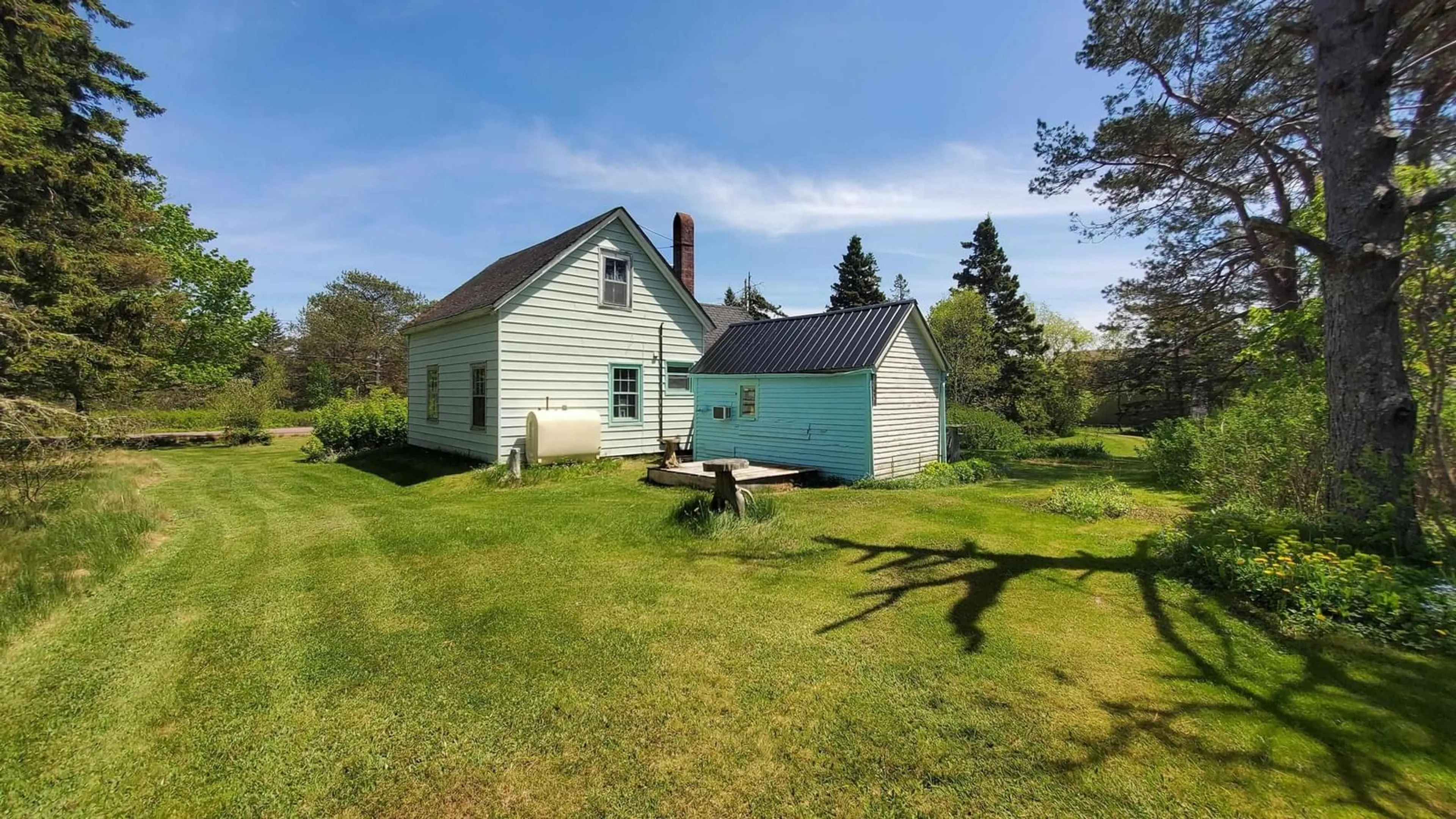 A pic from outside/outdoor area/front of a property/back of a property/a pic from drone, unknown for 147 Mill St, Parrsboro Nova Scotia B0M 1S0