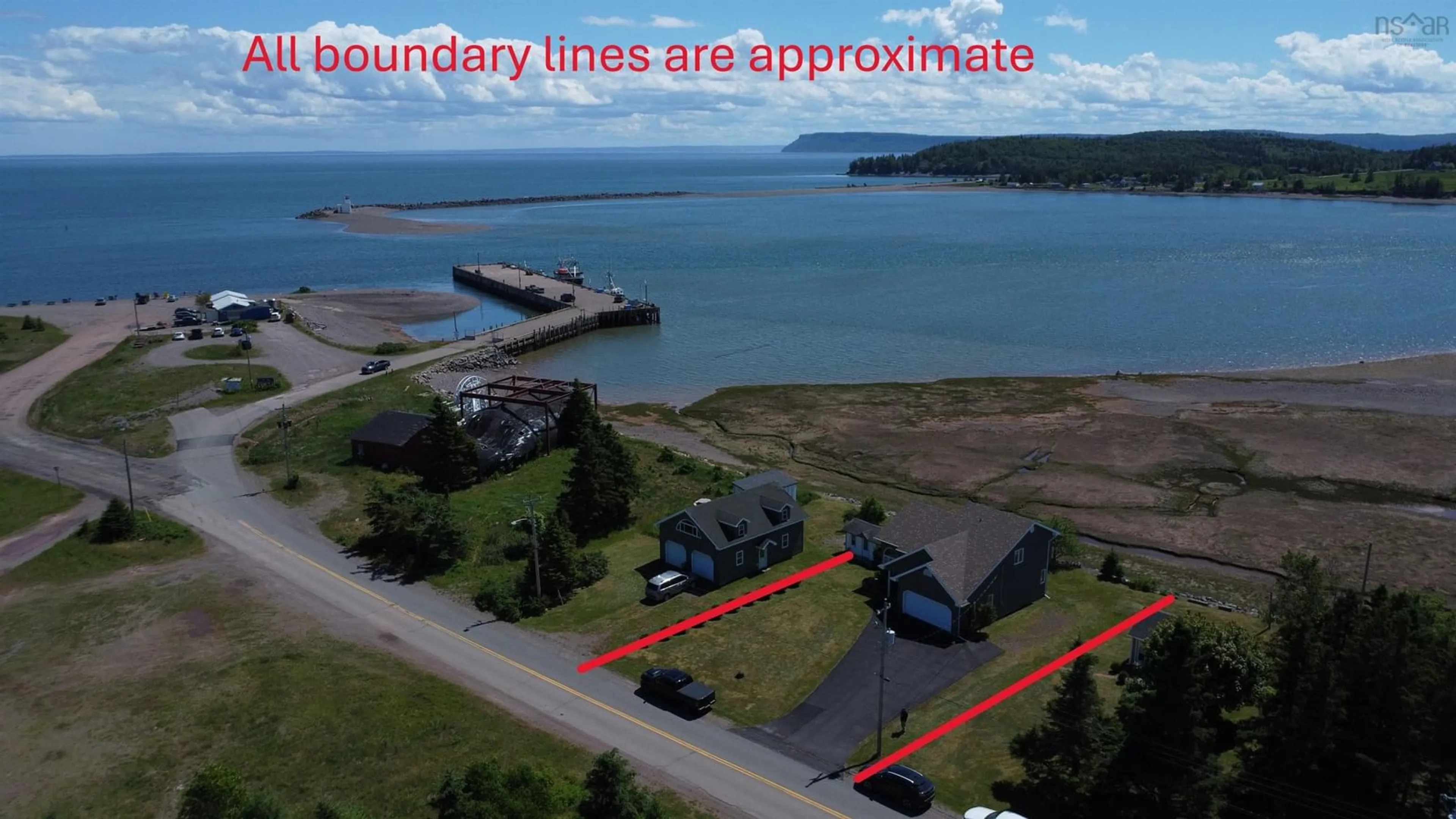 A pic from outside/outdoor area/front of a property/back of a property/a pic from drone, water/lake/river/ocean view for 394 Pier Rd, Parrsboro Nova Scotia B0M 1S0