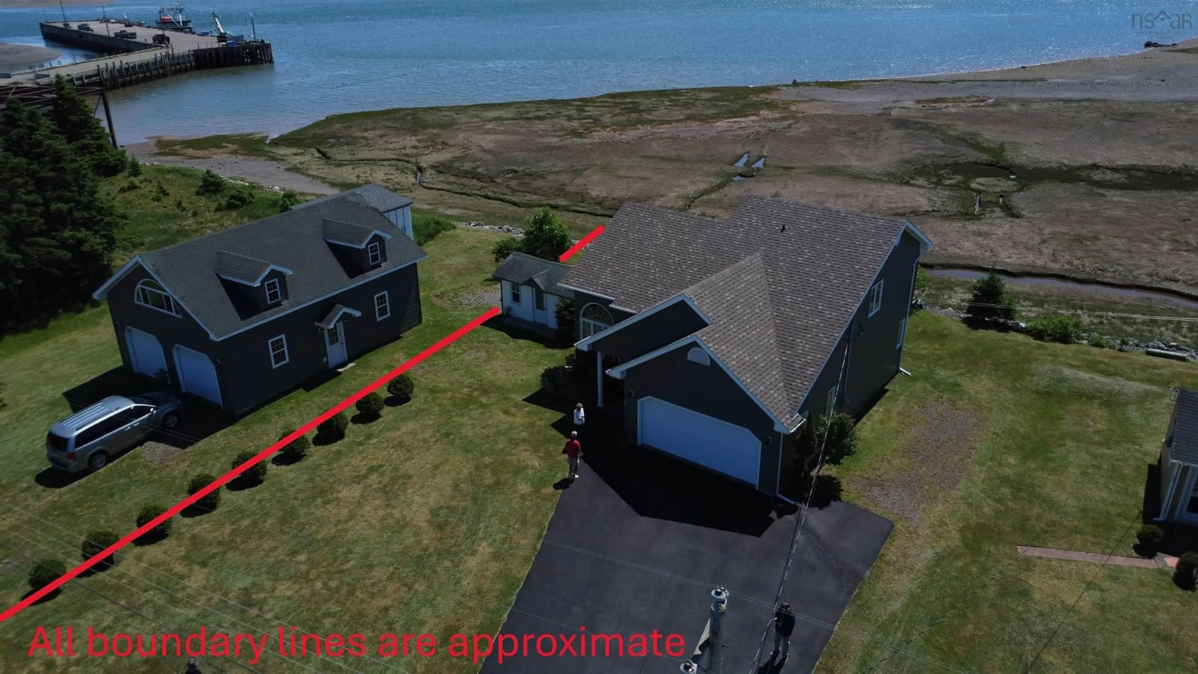 A pic from outside/outdoor area/front of a property/back of a property/a pic from drone, water/lake/river/ocean view for 394 Pier Rd, Parrsboro Nova Scotia B0M 1S0