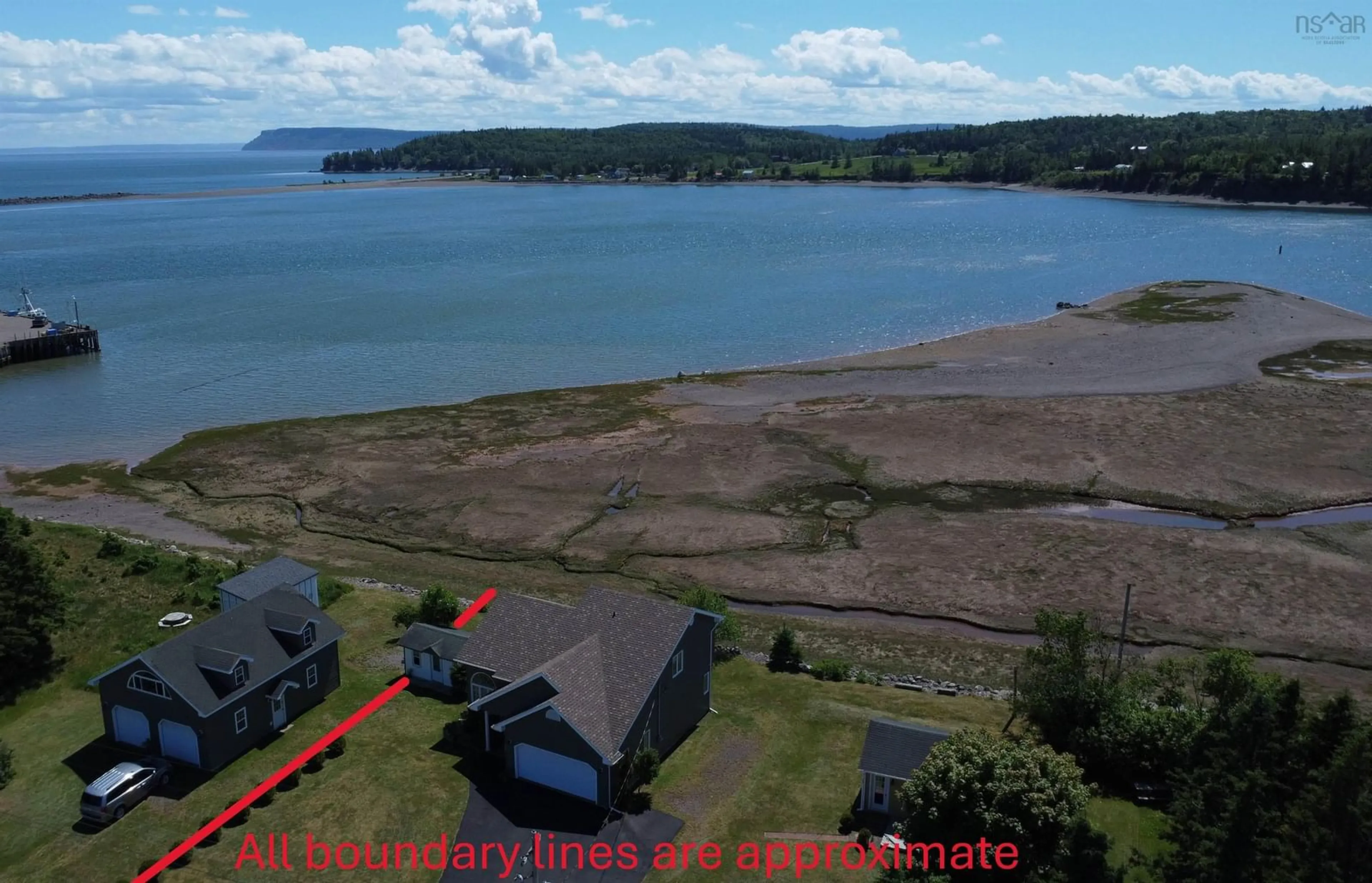 A pic from outside/outdoor area/front of a property/back of a property/a pic from drone, water/lake/river/ocean view for 394 Pier Rd, Parrsboro Nova Scotia B0M 1S0