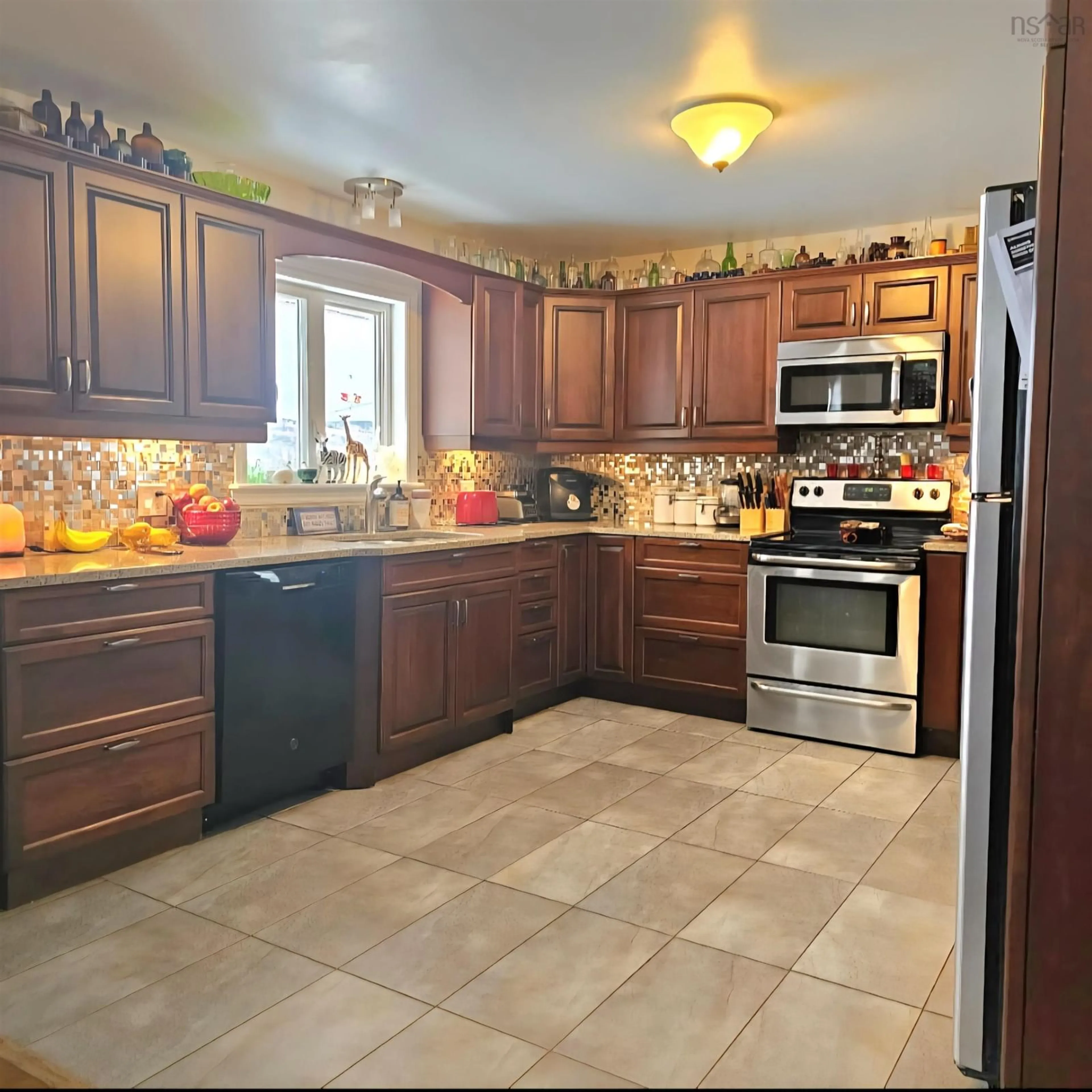 Open concept kitchen, ceramic/tile floor for 11197 Hwy 16 Riverside, Guysborough Nova Scotia B0H 1G0