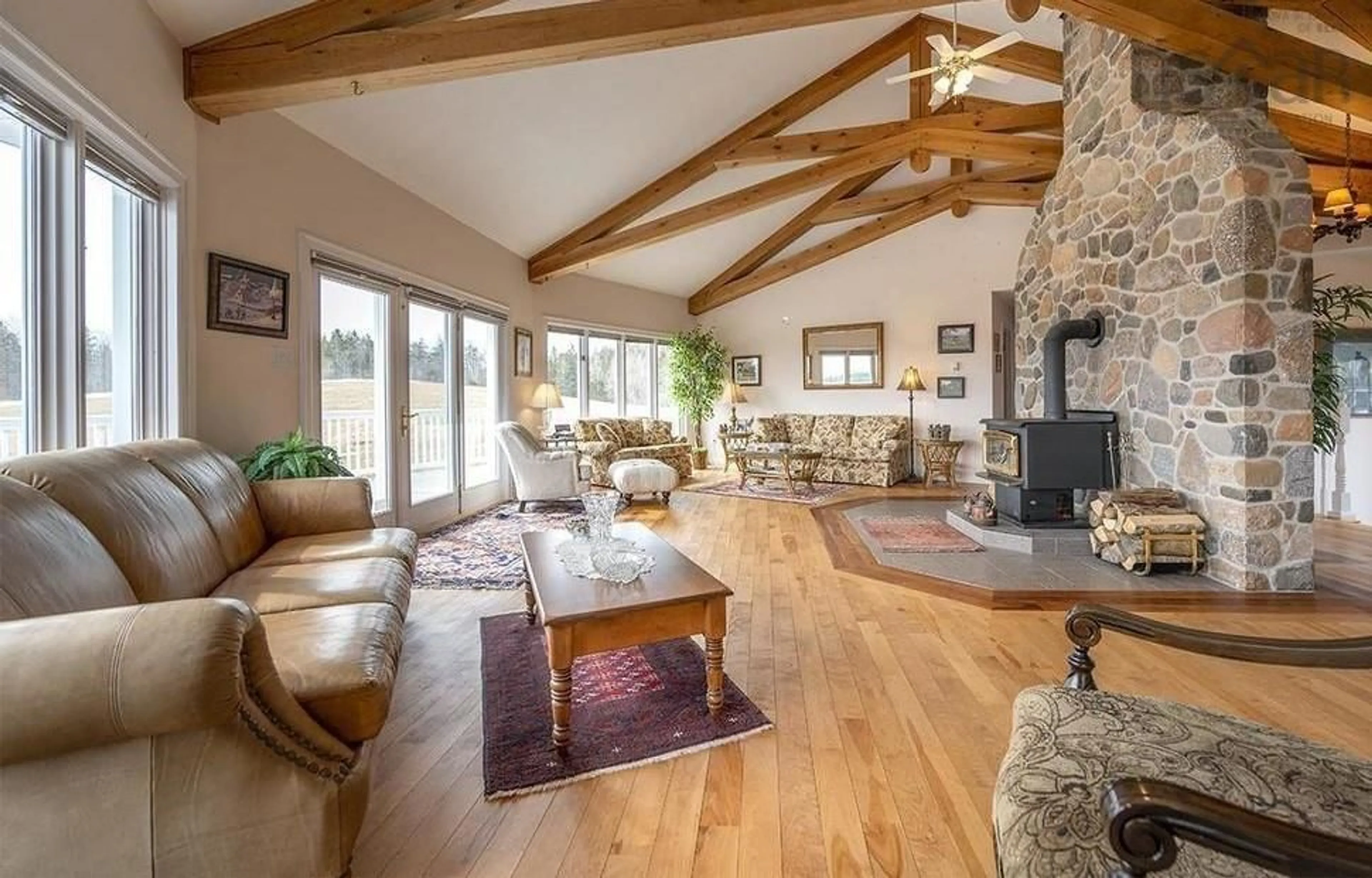 Living room with furniture, wood/laminate floor for 1379 Highway 362, Victoria Vale Nova Scotia B0S 1P0