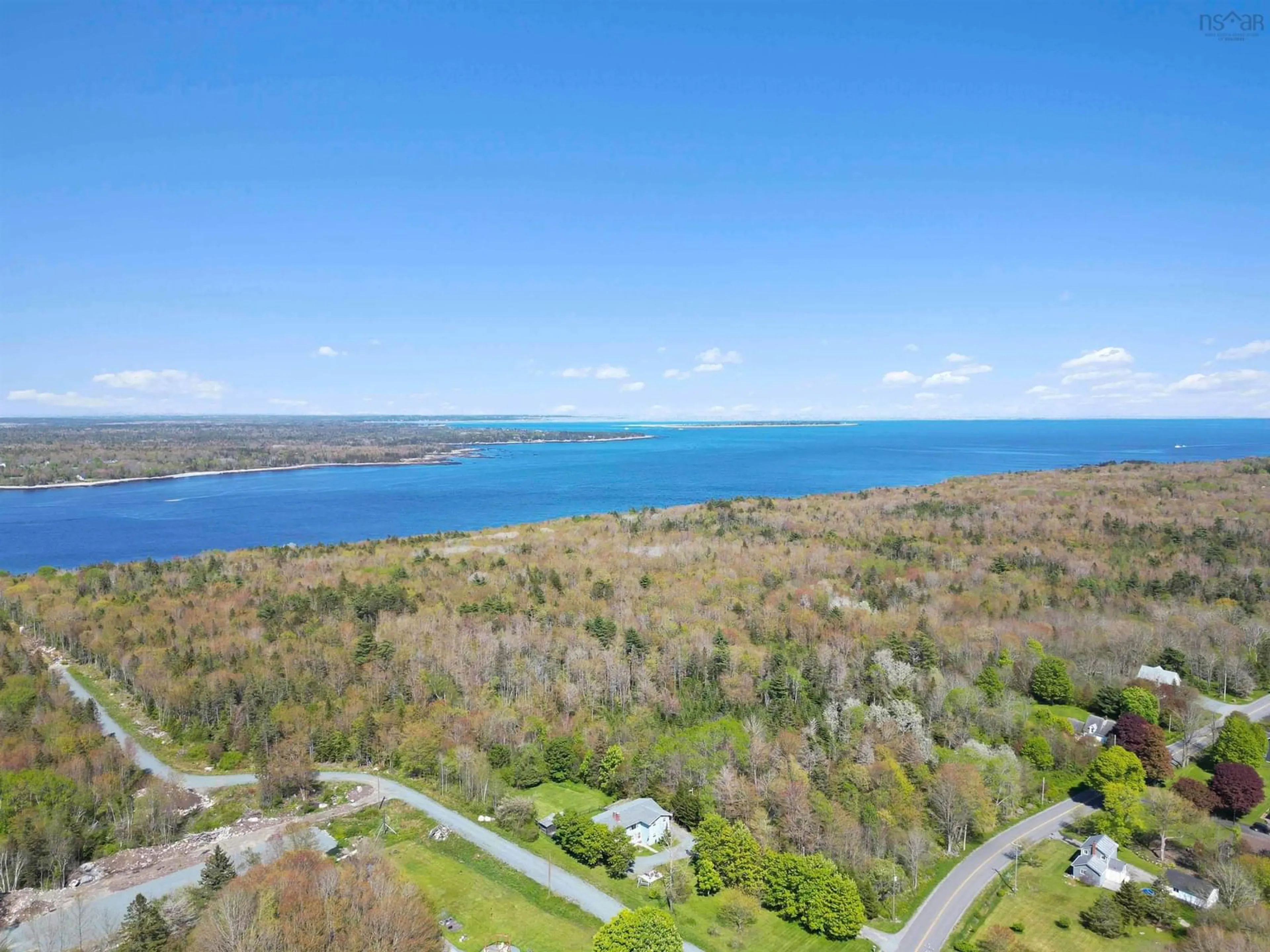 A pic from outside/outdoor area/front of a property/back of a property/a pic from drone, water/lake/river/ocean view for 147 Shore Rd, Mersey Point Nova Scotia B0T 1K0