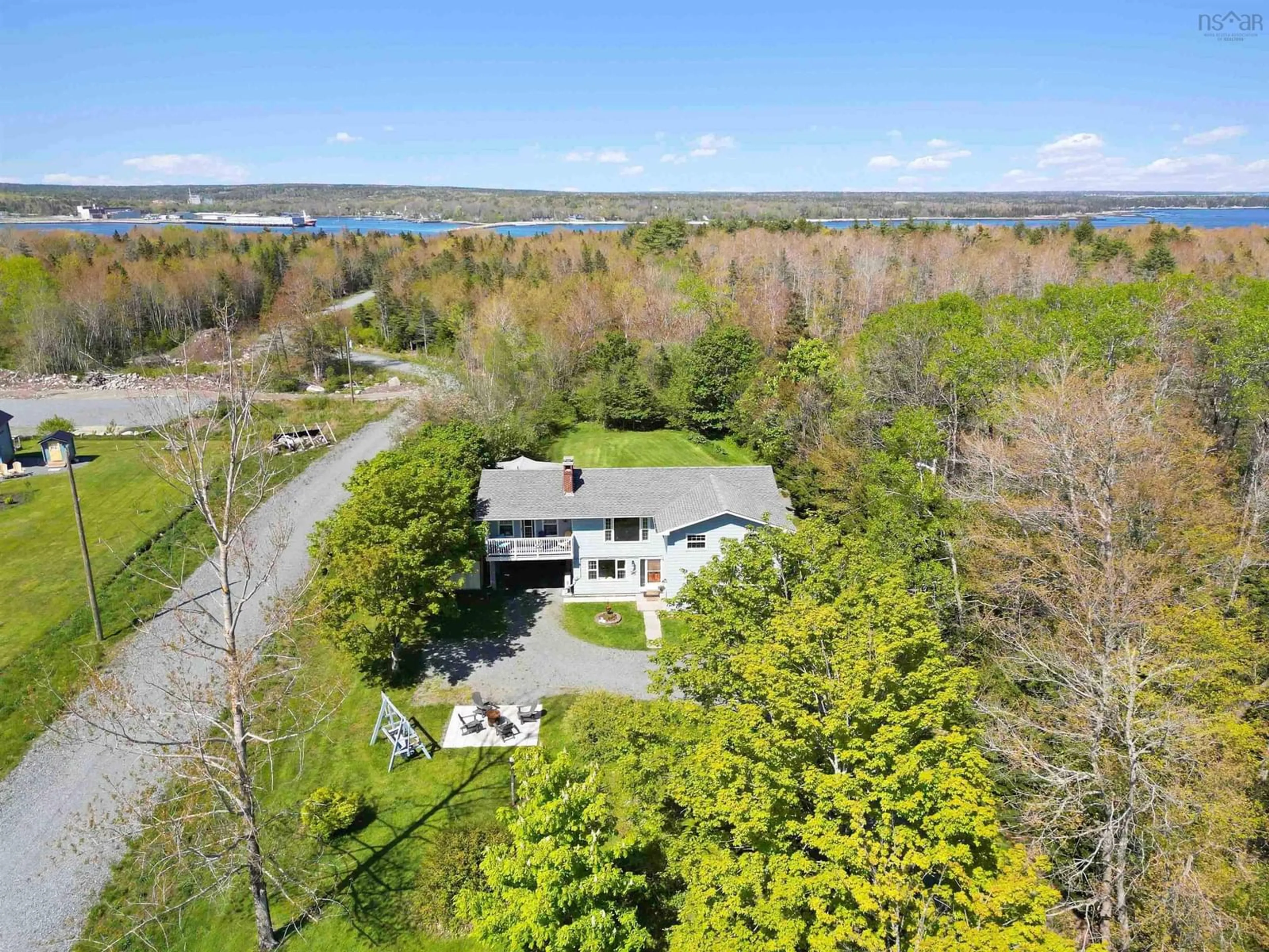 A pic from outside/outdoor area/front of a property/back of a property/a pic from drone, water/lake/river/ocean view for 147 Shore Rd, Mersey Point Nova Scotia B0T 1K0
