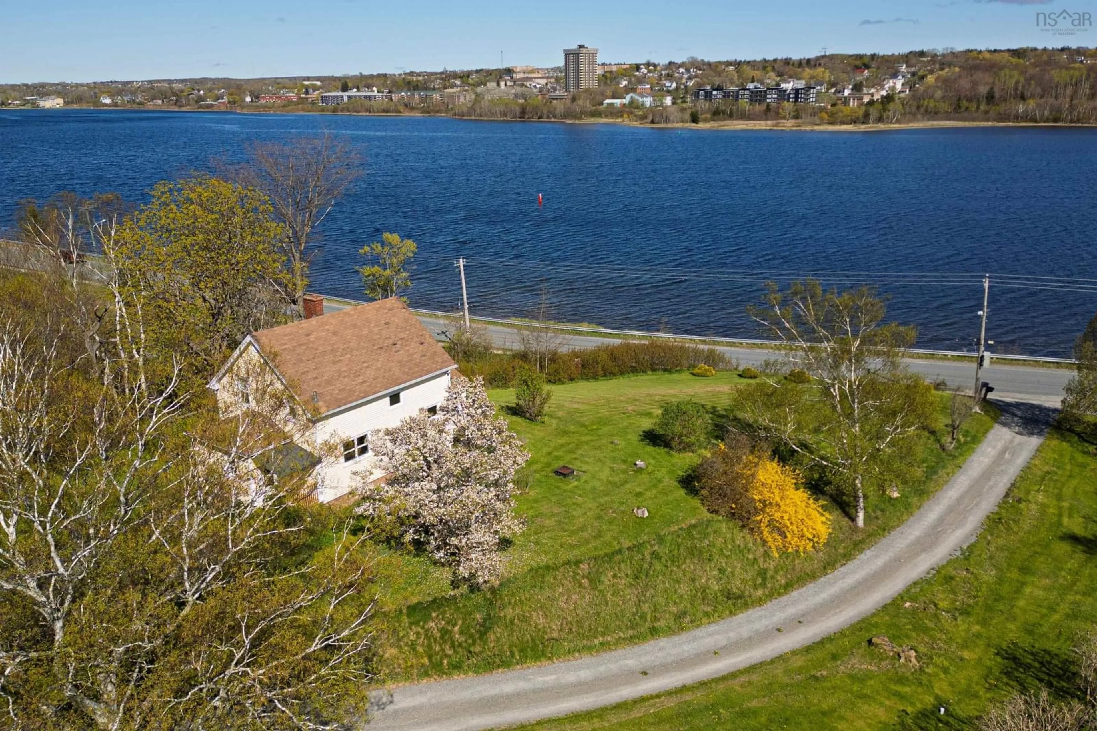 A pic from outside/outdoor area/front of a property/back of a property/a pic from drone, water/lake/river/ocean view for 127 Westmount Rd, Westmount Nova Scotia B1R 1A2