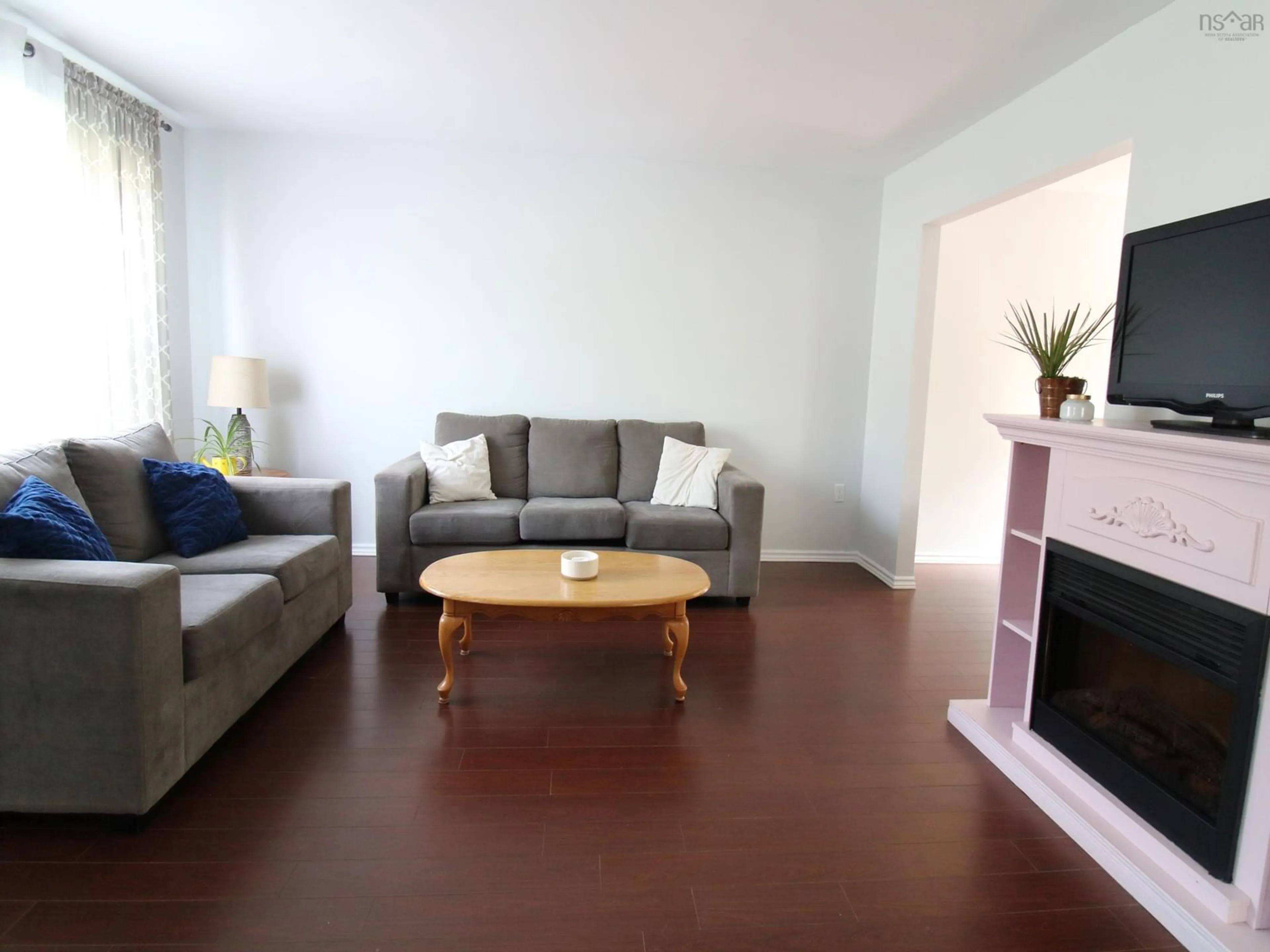 Living room with furniture, wood/laminate floor for 54 Valkyrie Cres, Dartmouth Nova Scotia B2W 5B6