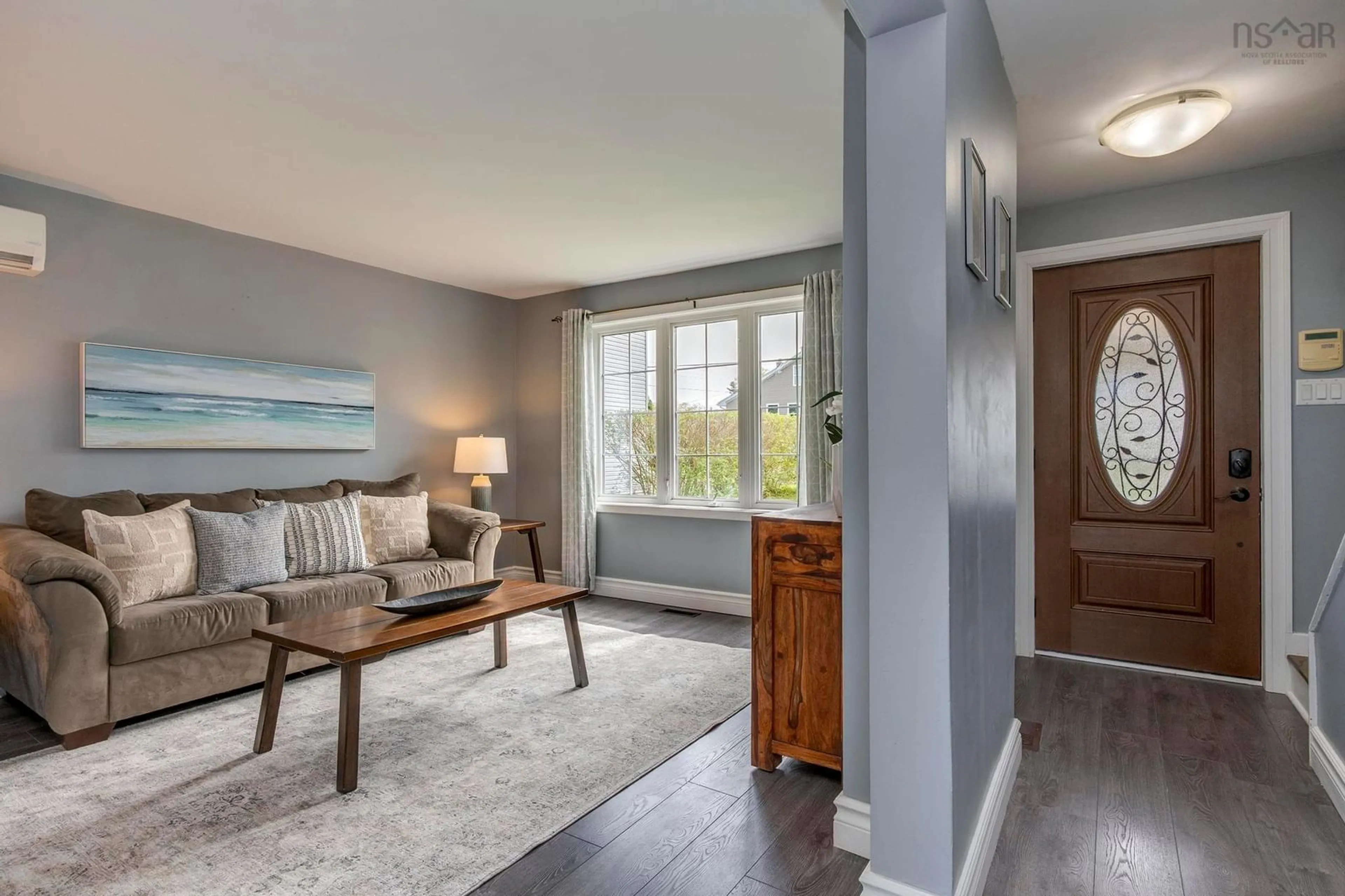 Living room with furniture, wood/laminate floor for 3 Hayes St, Halifax Nova Scotia B3R 2B6