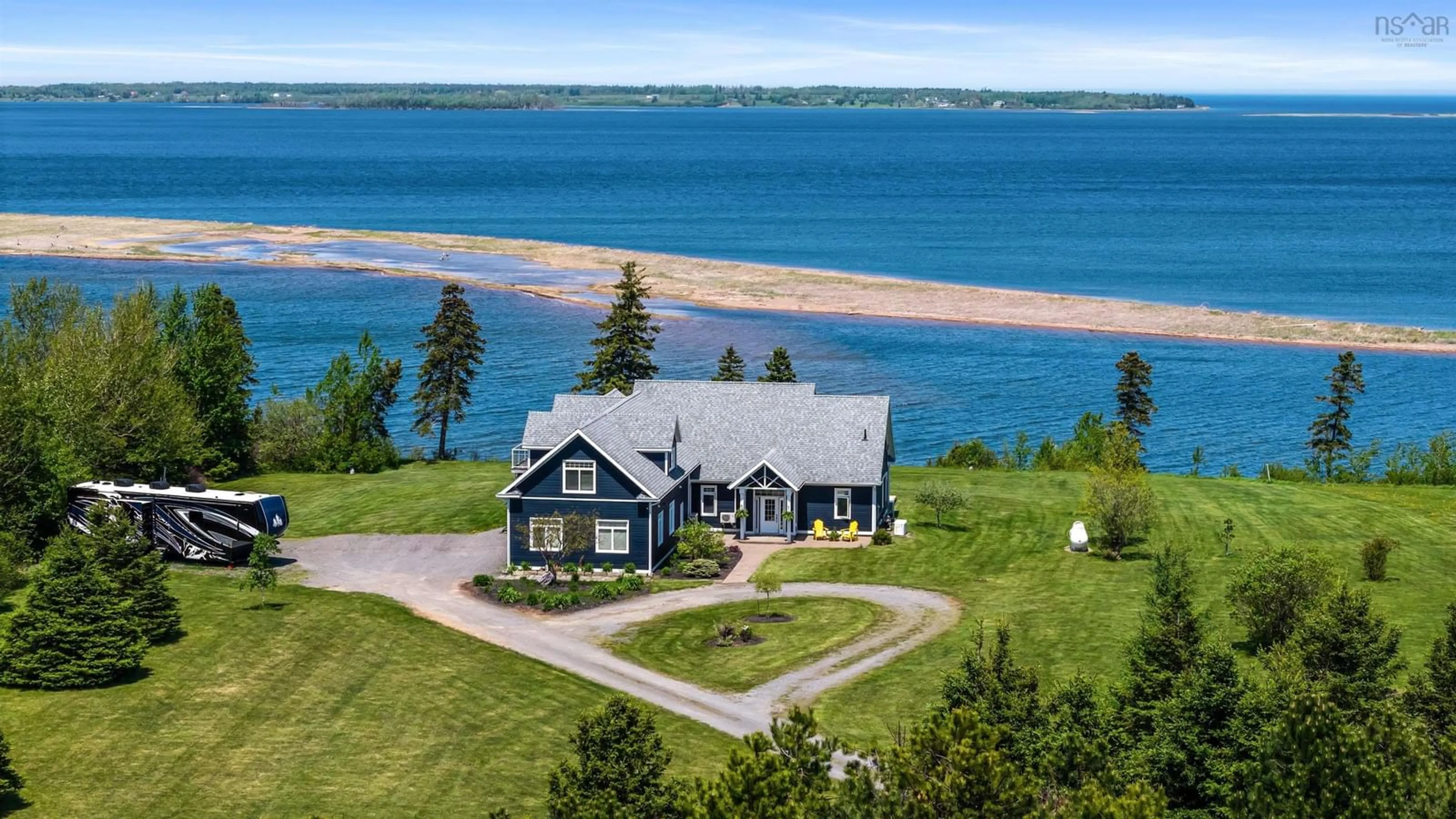A pic from outside/outdoor area/front of a property/back of a property/a pic from drone, water/lake/river/ocean view for 76 Sandview Lane, Malagash Nova Scotia B0S 1E0