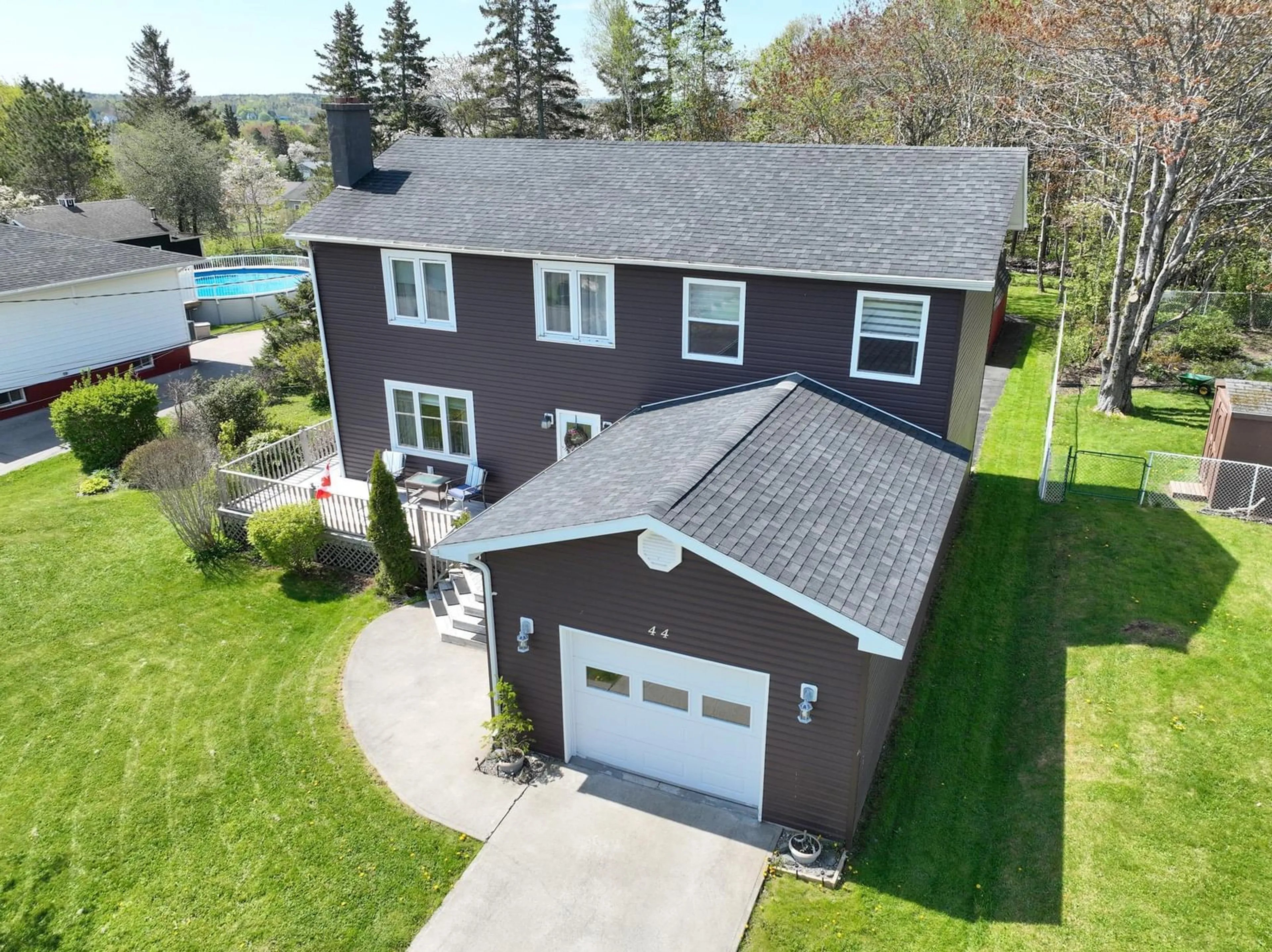 A pic from outside/outdoor area/front of a property/back of a property/a pic from drone, street for 44 Hillcrest Dr, Coxheath Nova Scotia B1R 1V2