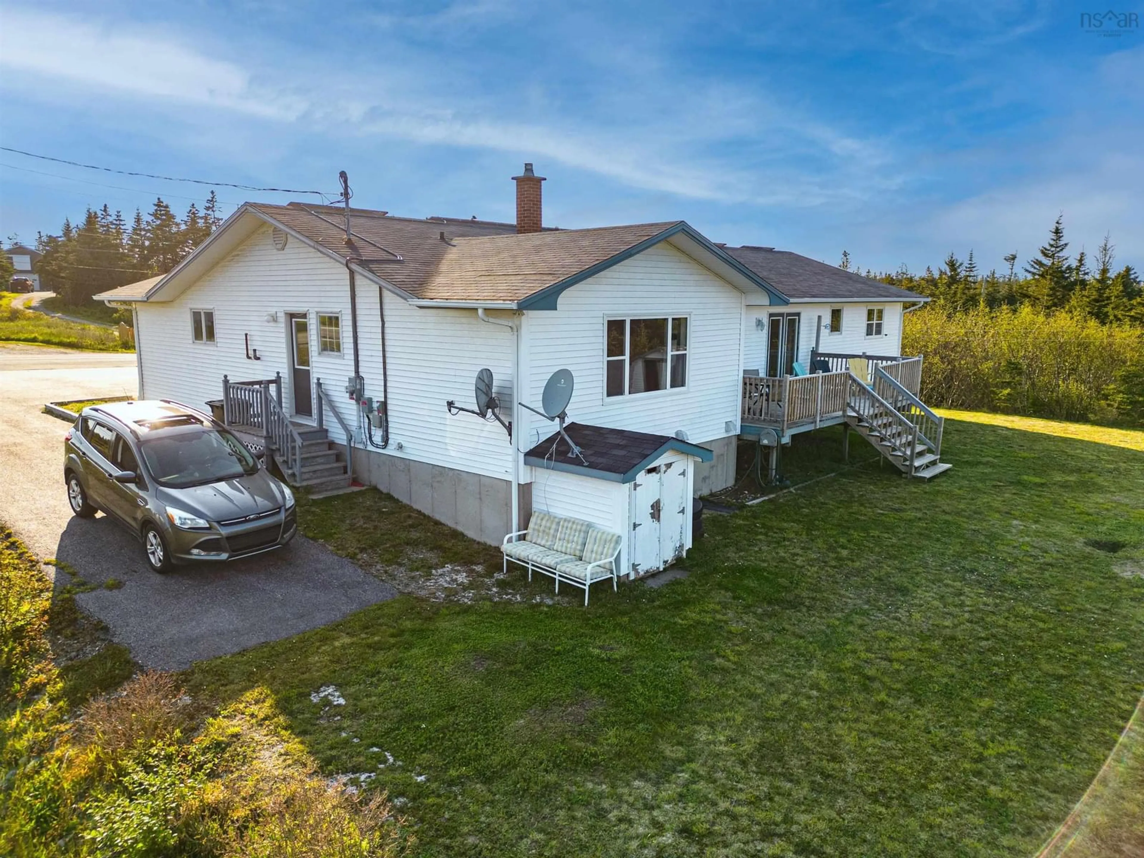 A pic from outside/outdoor area/front of a property/back of a property/a pic from drone, building for 317 Bear Point Rd, Bear Point Nova Scotia B0W 3B0
