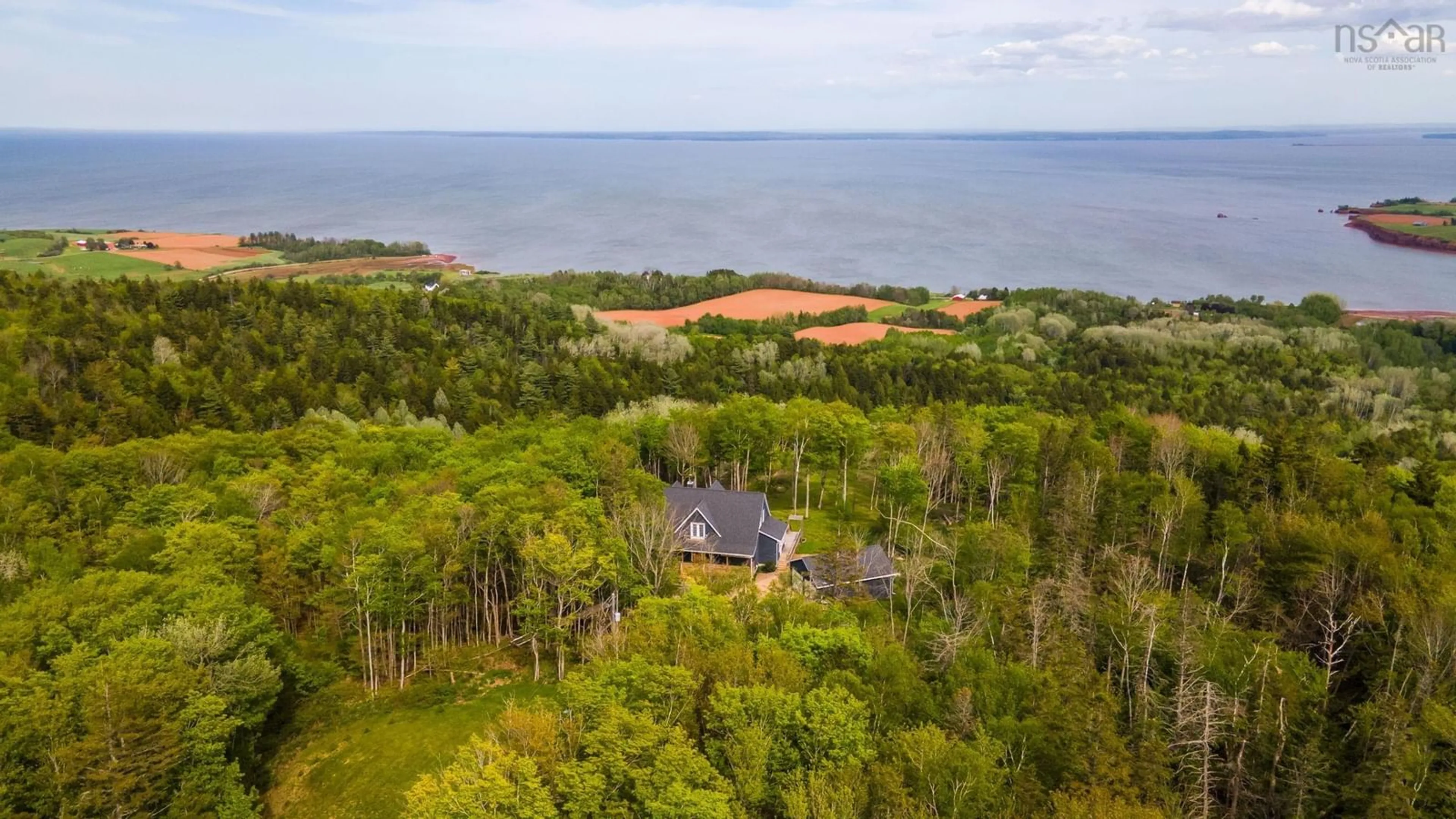 A pic from outside/outdoor area/front of a property/back of a property/a pic from drone, water/lake/river/ocean view for 3746 358 Hwy, South Scots Bay Nova Scotia B0P 1H0