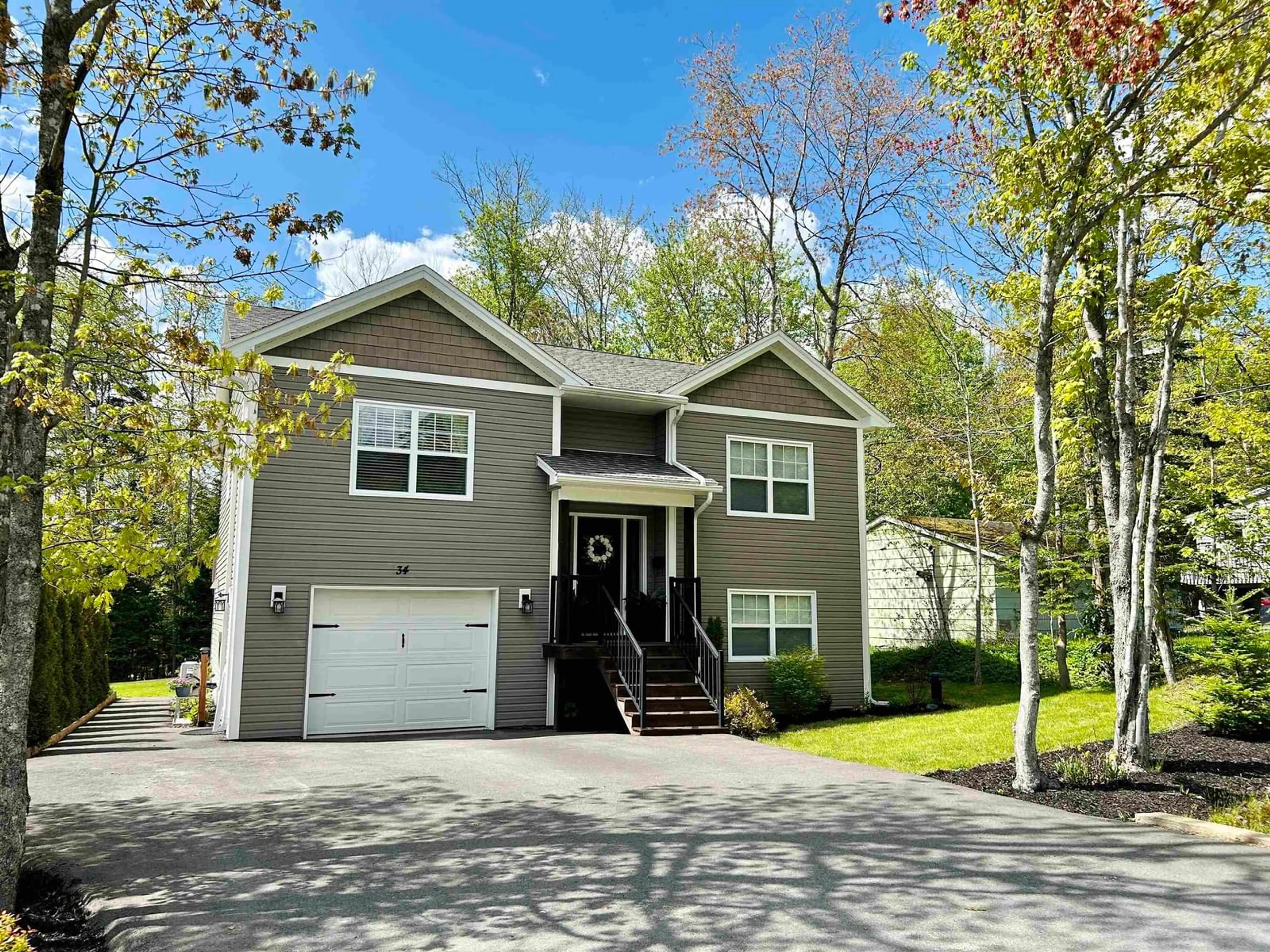 Home with vinyl exterior material, street for 34 Holland Rd, Fletchers Lake Nova Scotia B2T 1J3
