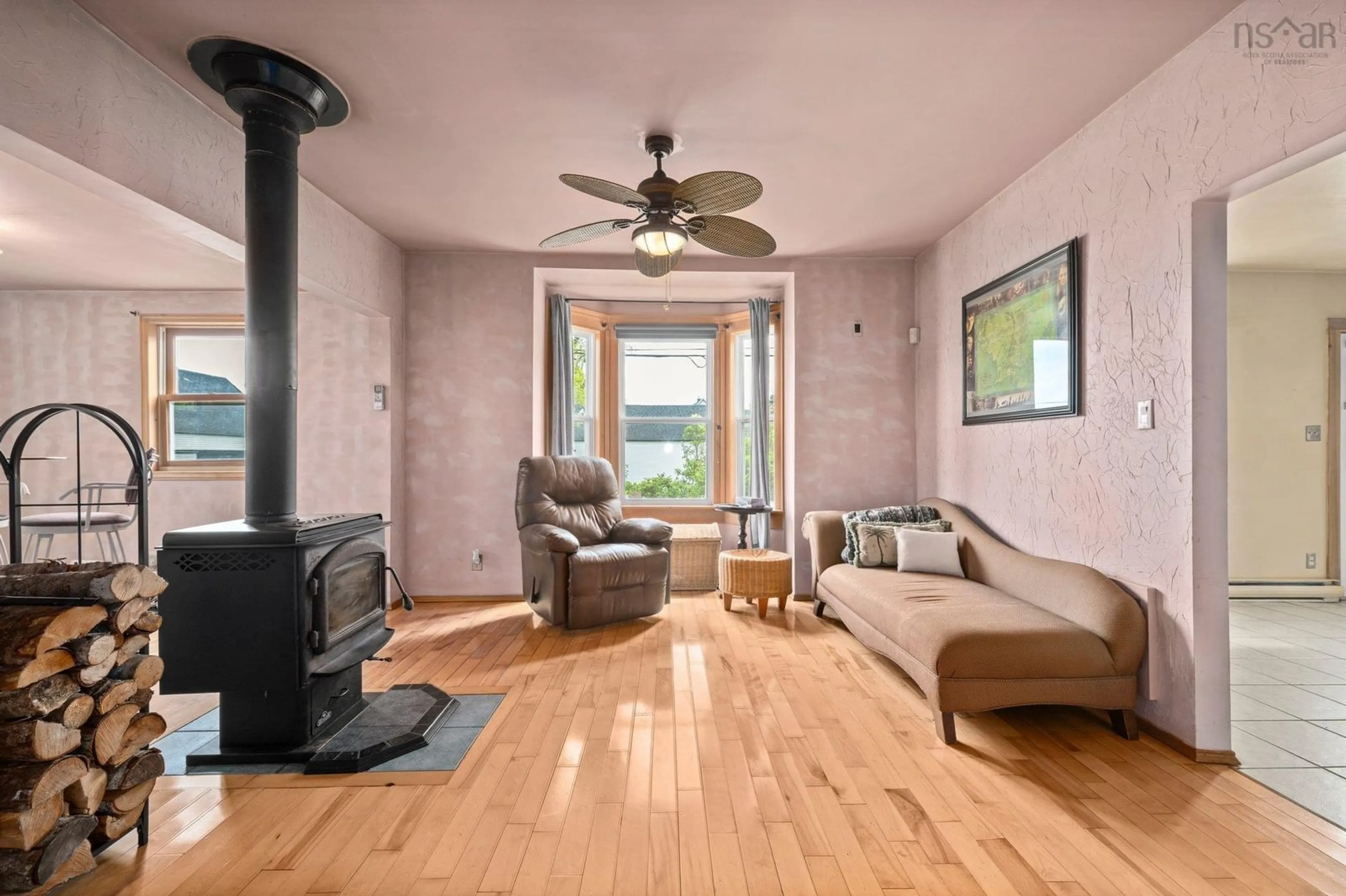 Living room with furniture, wood/laminate floor for 8754 Highway 331, Voglers Cove Nova Scotia B0J 2H0