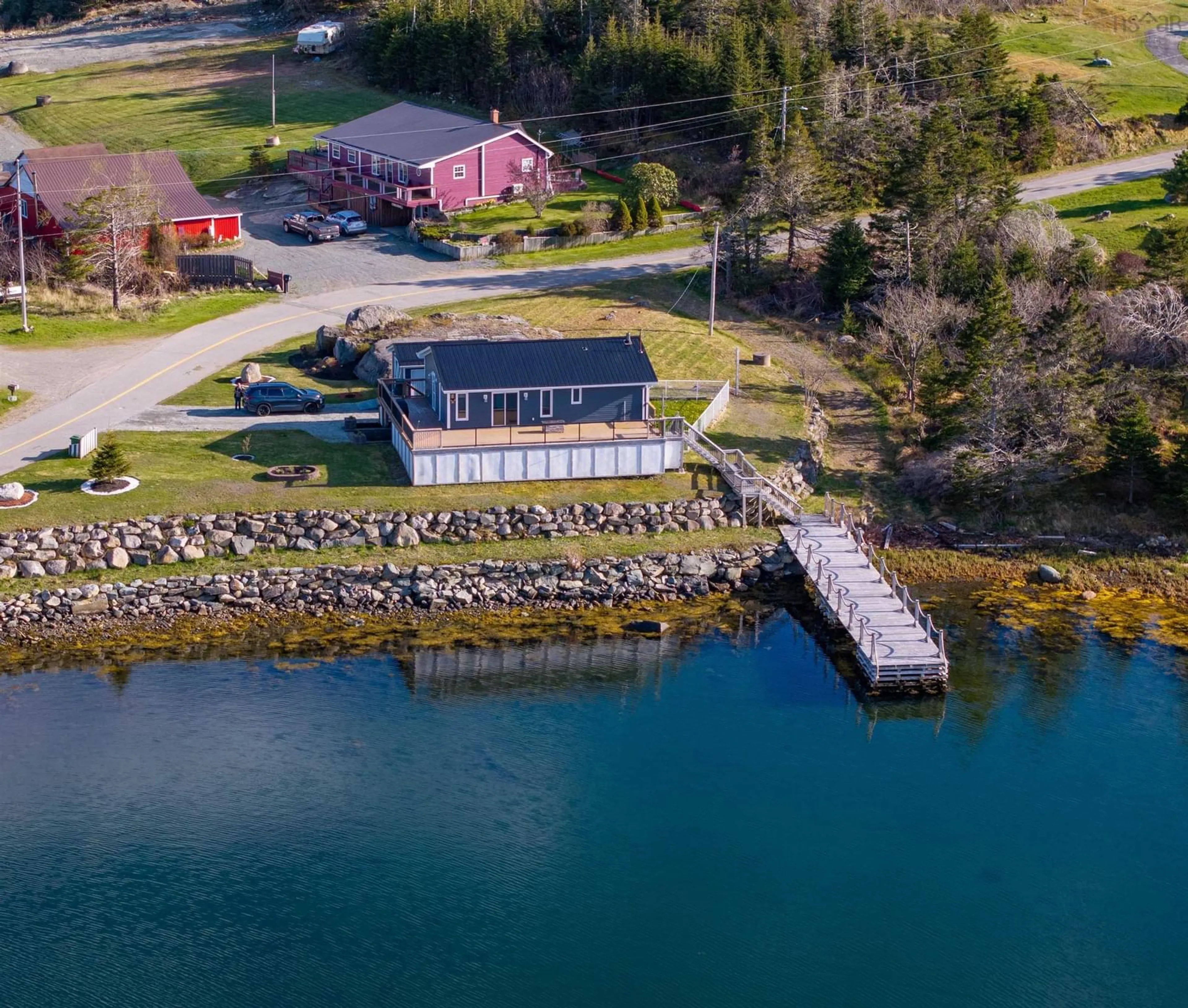 A pic from outside/outdoor area/front of a property/back of a property/a pic from drone, water/lake/river/ocean view for 549 Sober Island Rd, Sober Island Nova Scotia B0J 3B0