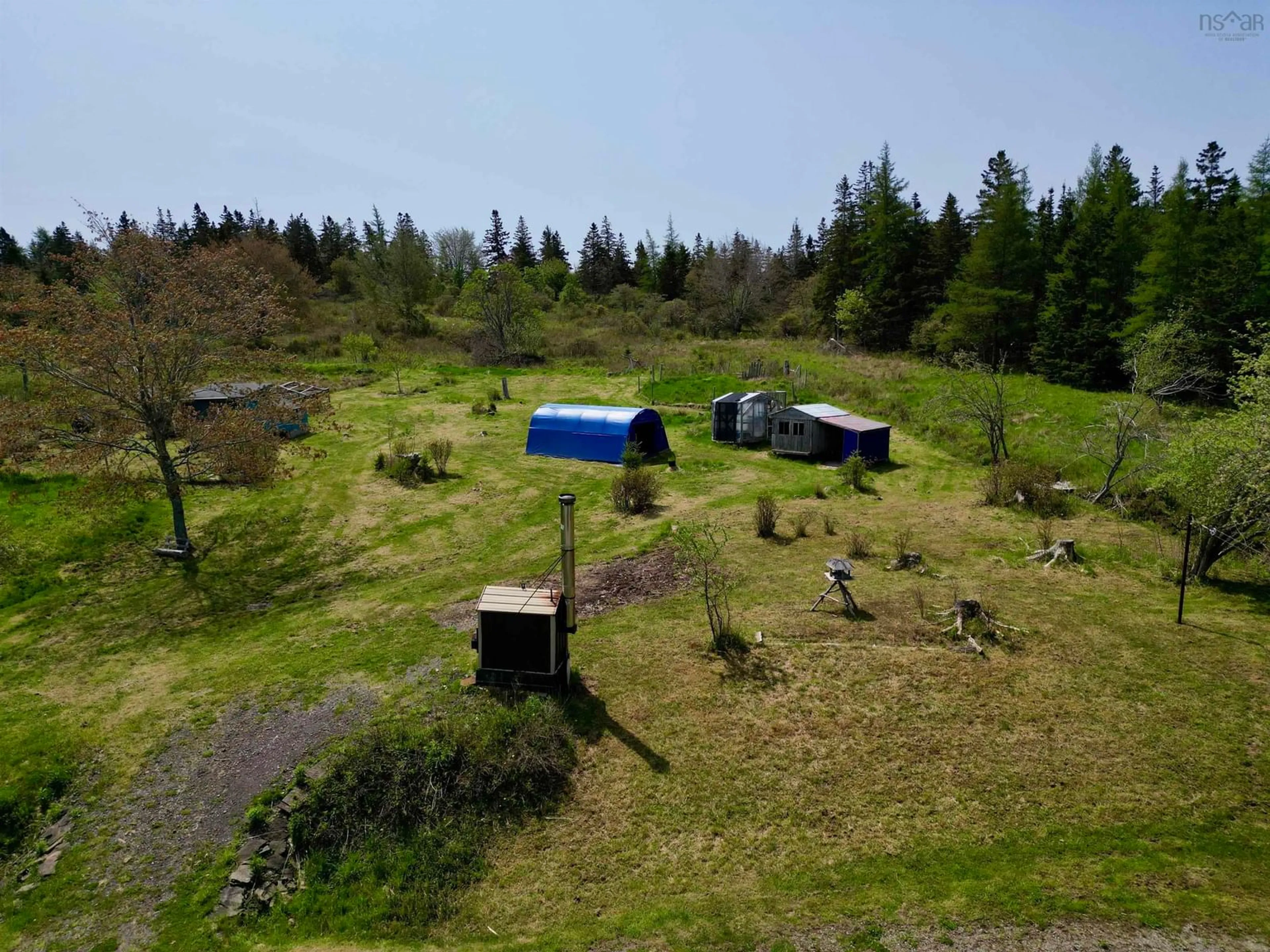 A pic from outside/outdoor area/front of a property/back of a property/a pic from drone, forest/trees view for 2714 Highway 320, Poulamon Nova Scotia B0E 1K0