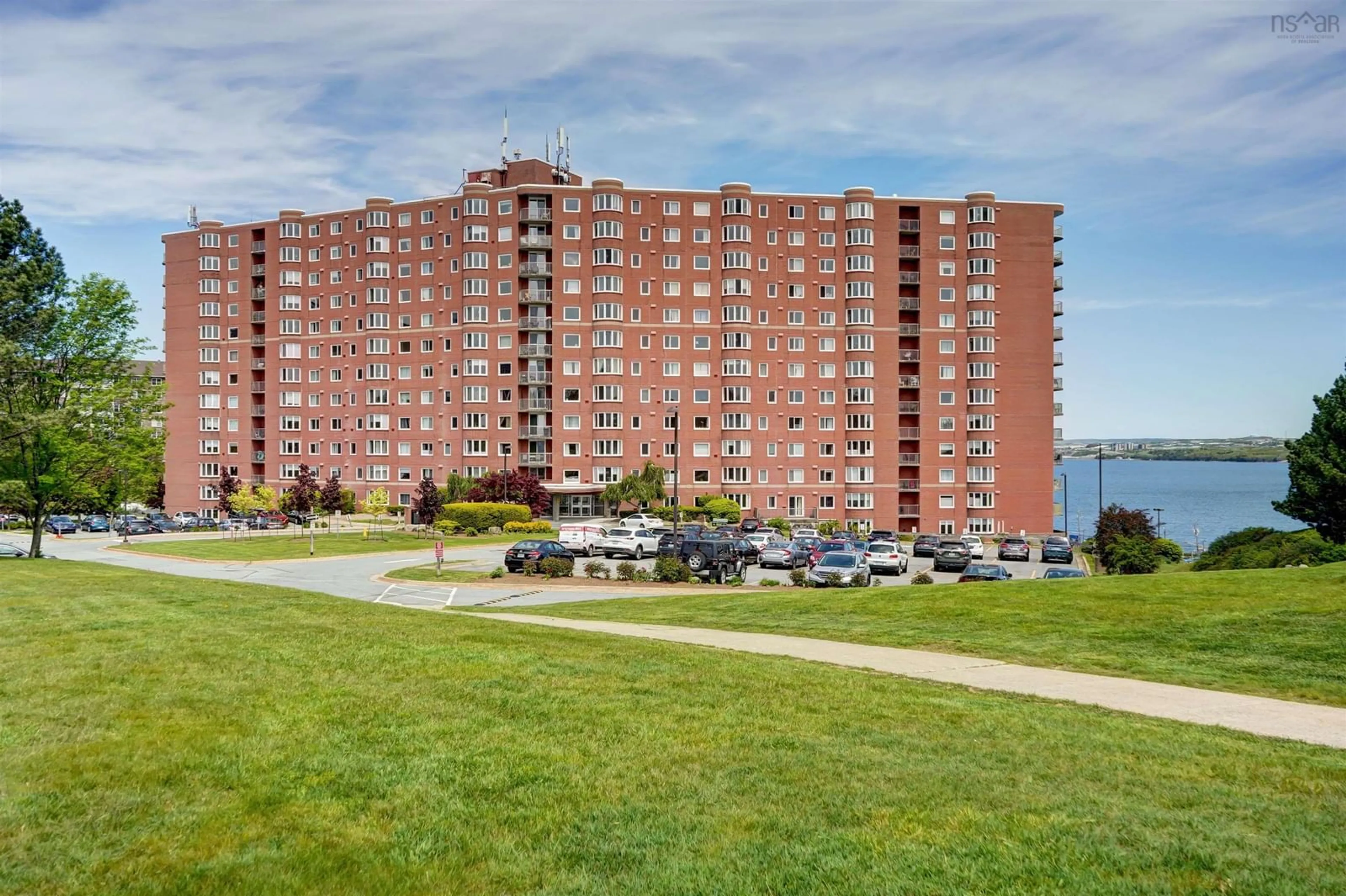 A pic from outside/outdoor area/front of a property/back of a property/a pic from drone, water/lake/river/ocean view for 45 Vimy Ave #118, Halifax Nova Scotia B3M 4C5