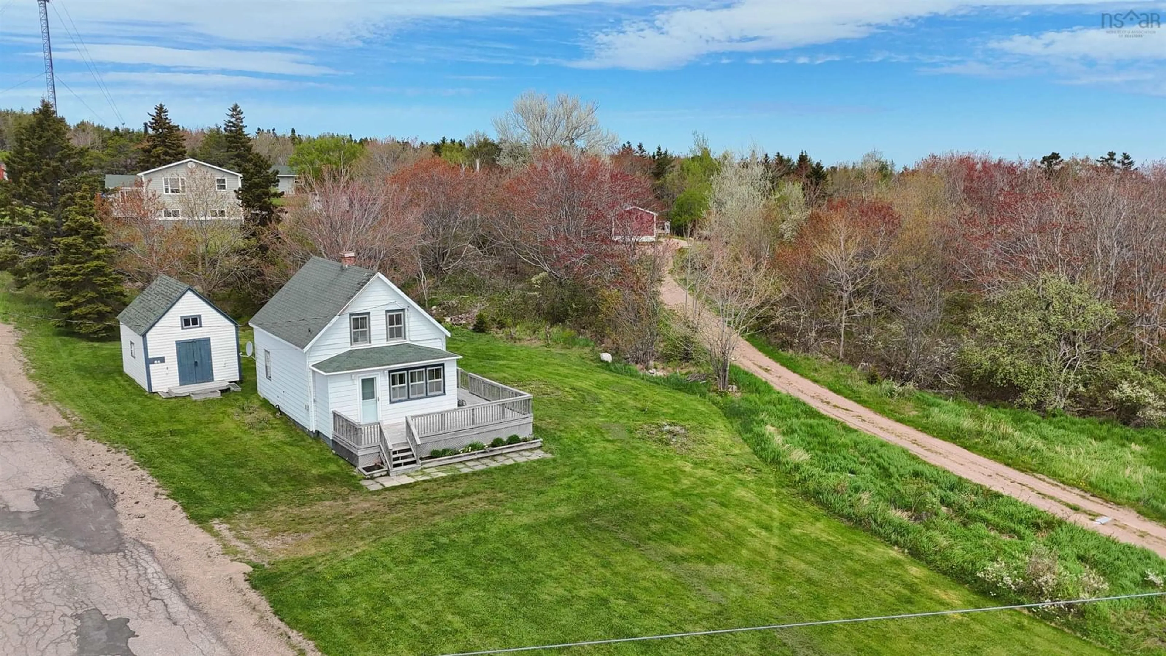 A pic from outside/outdoor area/front of a property/back of a property/a pic from drone, street for 64 Ocean View Dr, Neils Harbour Nova Scotia B0C 1N0