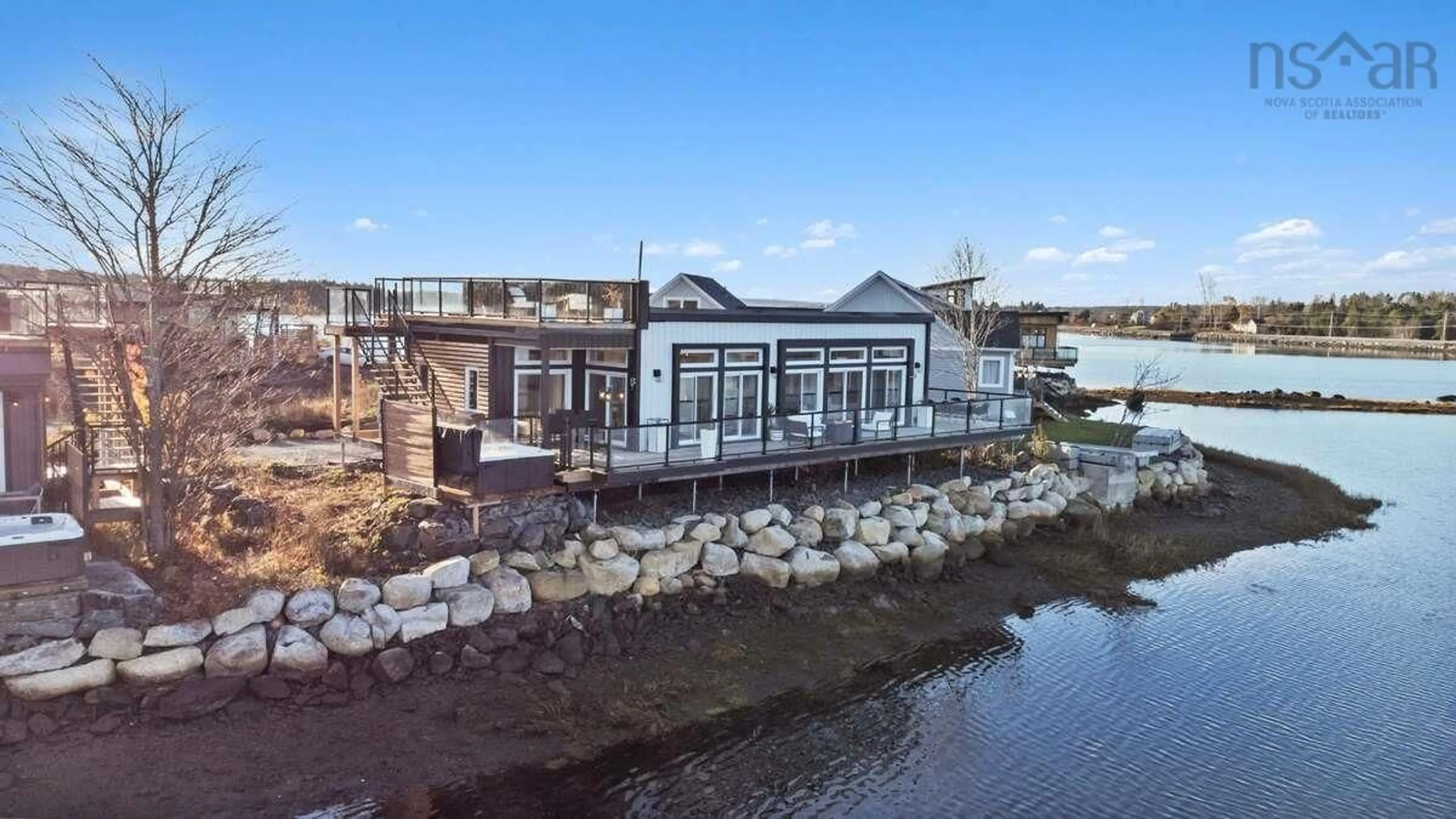 A pic from outside/outdoor area/front of a property/back of a property/a pic from drone, water/lake/river/ocean view for 693 Masons Beach Rd #2, First South Nova Scotia B0J 2C0