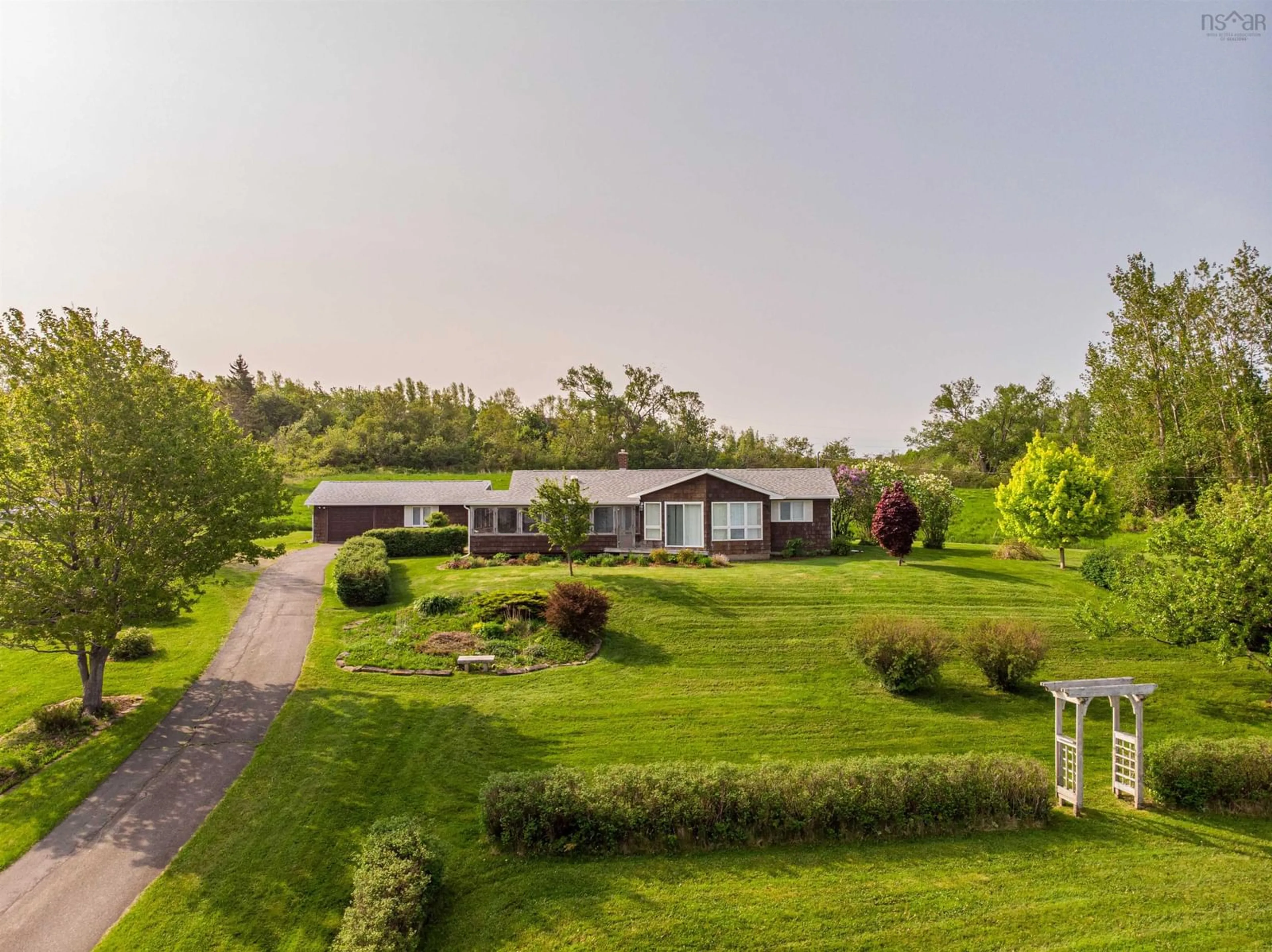 A pic from outside/outdoor area/front of a property/back of a property/a pic from drone, unknown for 1952 Shore Road, Merigomish, N.S., Merigomish Nova Scotia B0K 1G0
