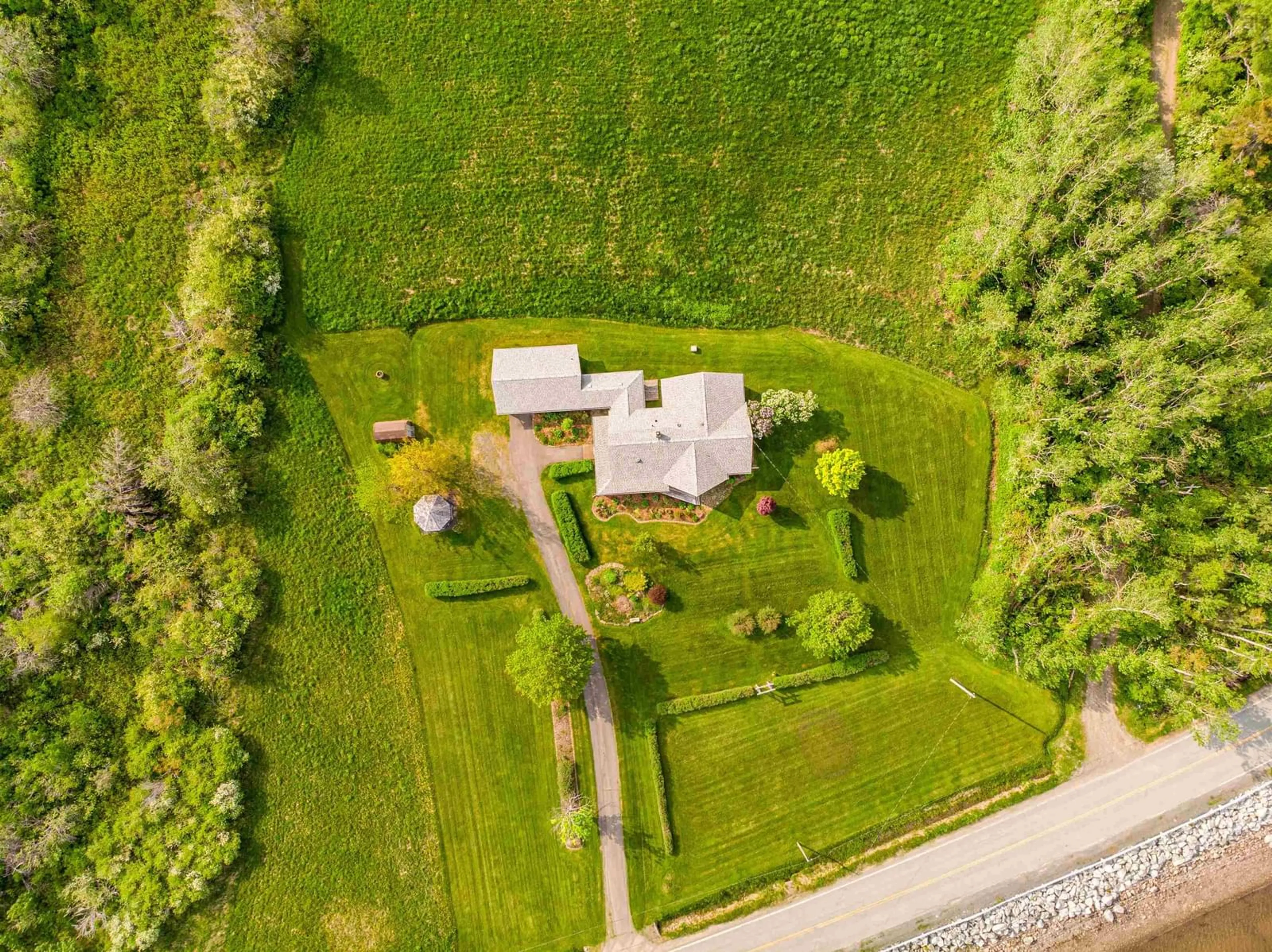 A pic from outside/outdoor area/front of a property/back of a property/a pic from drone, street for 1952 Shore Road, Merigomish, N.S., Merigomish Nova Scotia B0K 1G0