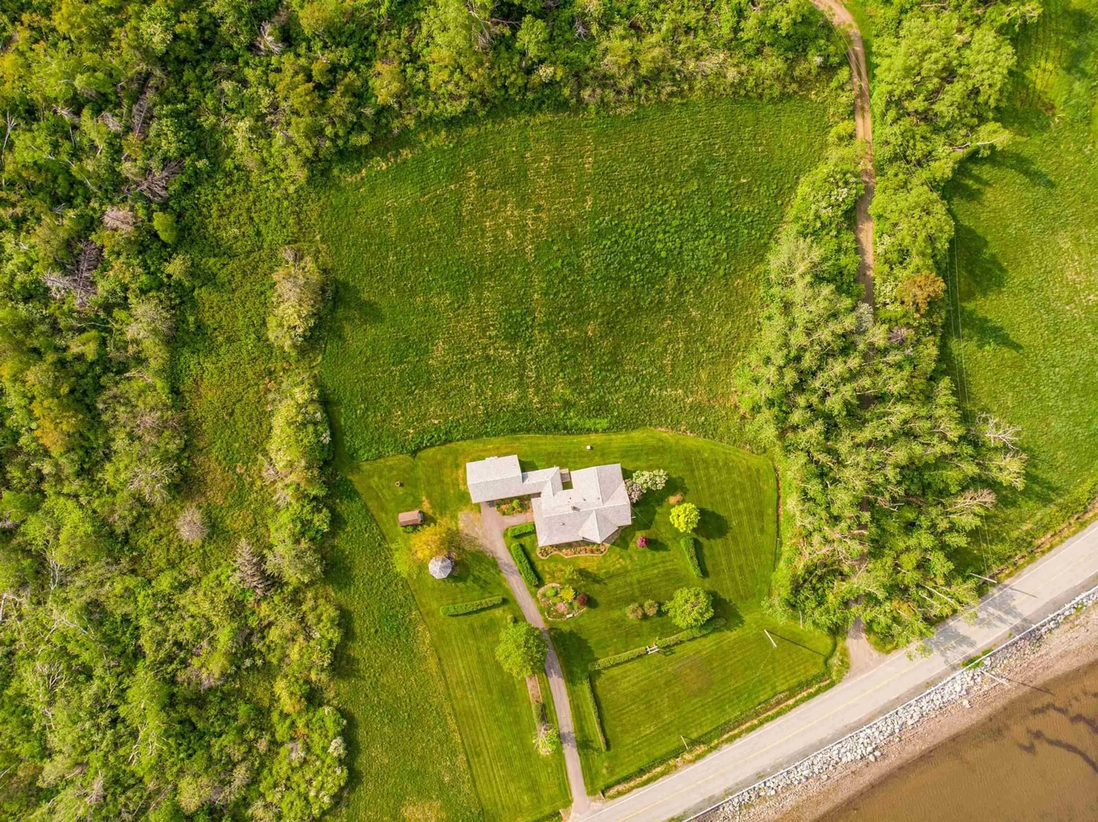 A pic from outside/outdoor area/front of a property/back of a property/a pic from drone, unknown for 1952 Shore Road, Merigomish, N.S., Merigomish Nova Scotia B0K 1G0