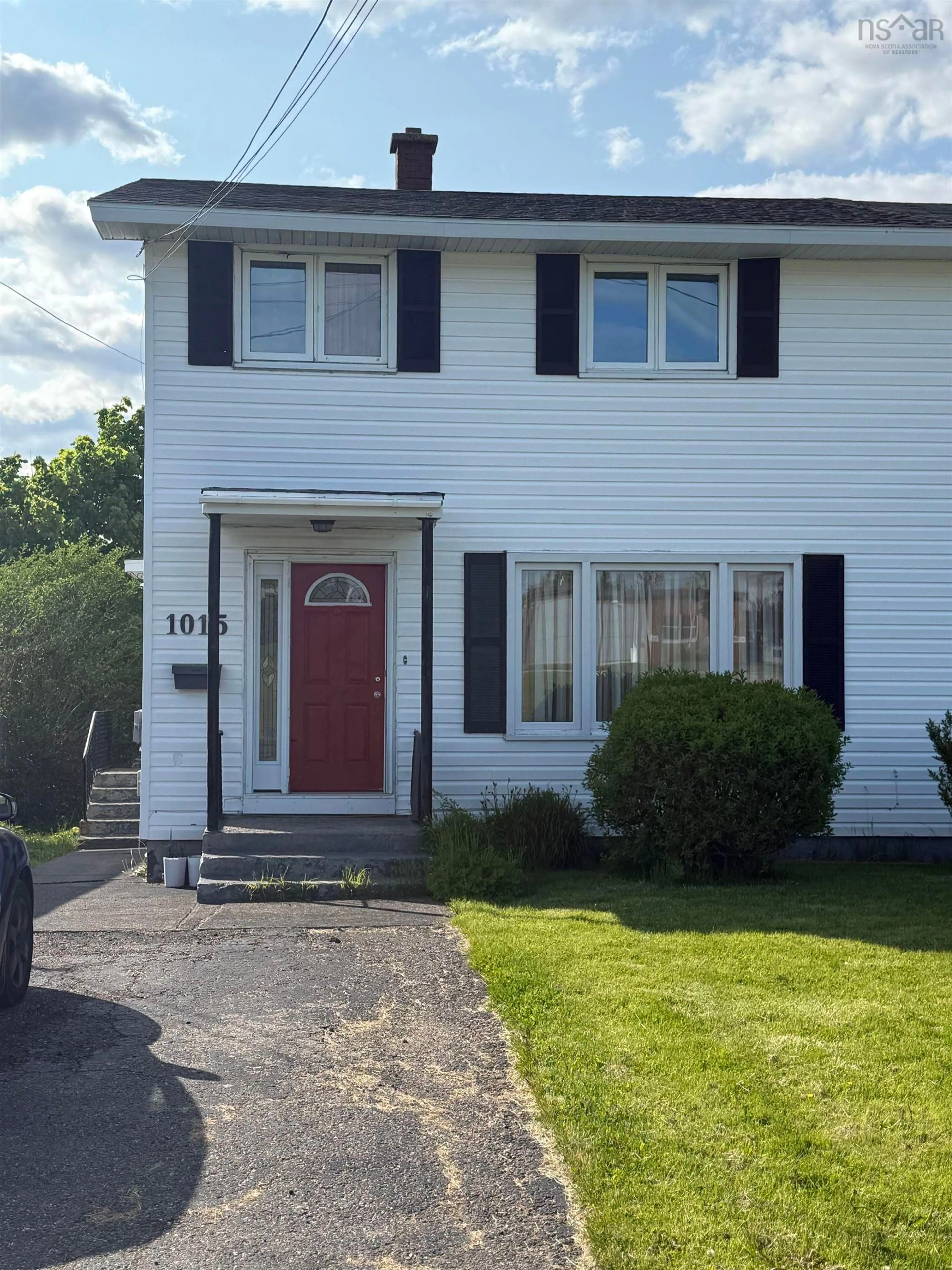 Home with vinyl exterior material, street for 1015 Upper Prince St, Sydney Nova Scotia B1P 5P3