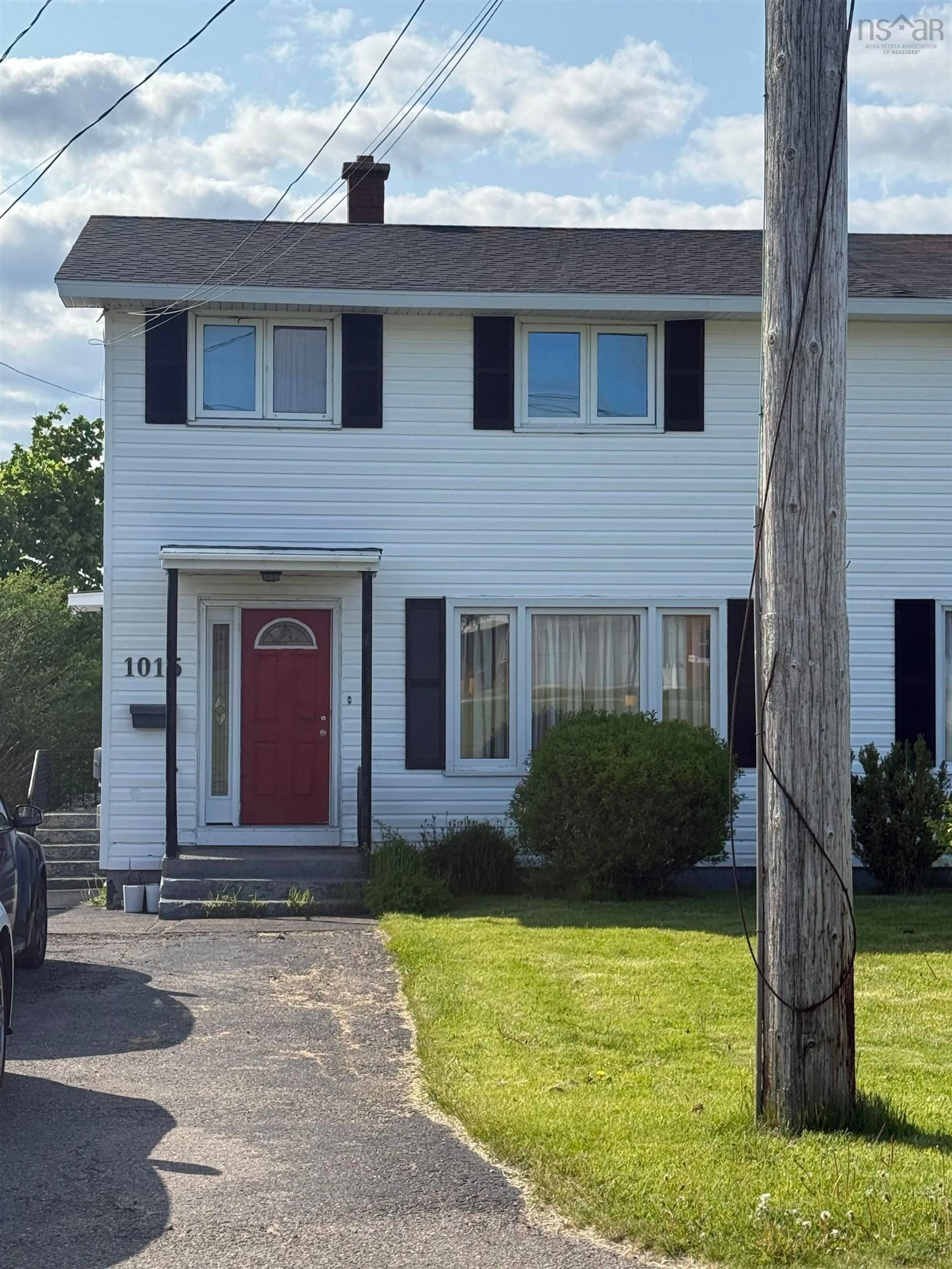 Home with vinyl exterior material, street for 1015 Upper Prince St, Sydney Nova Scotia B1P 5P3