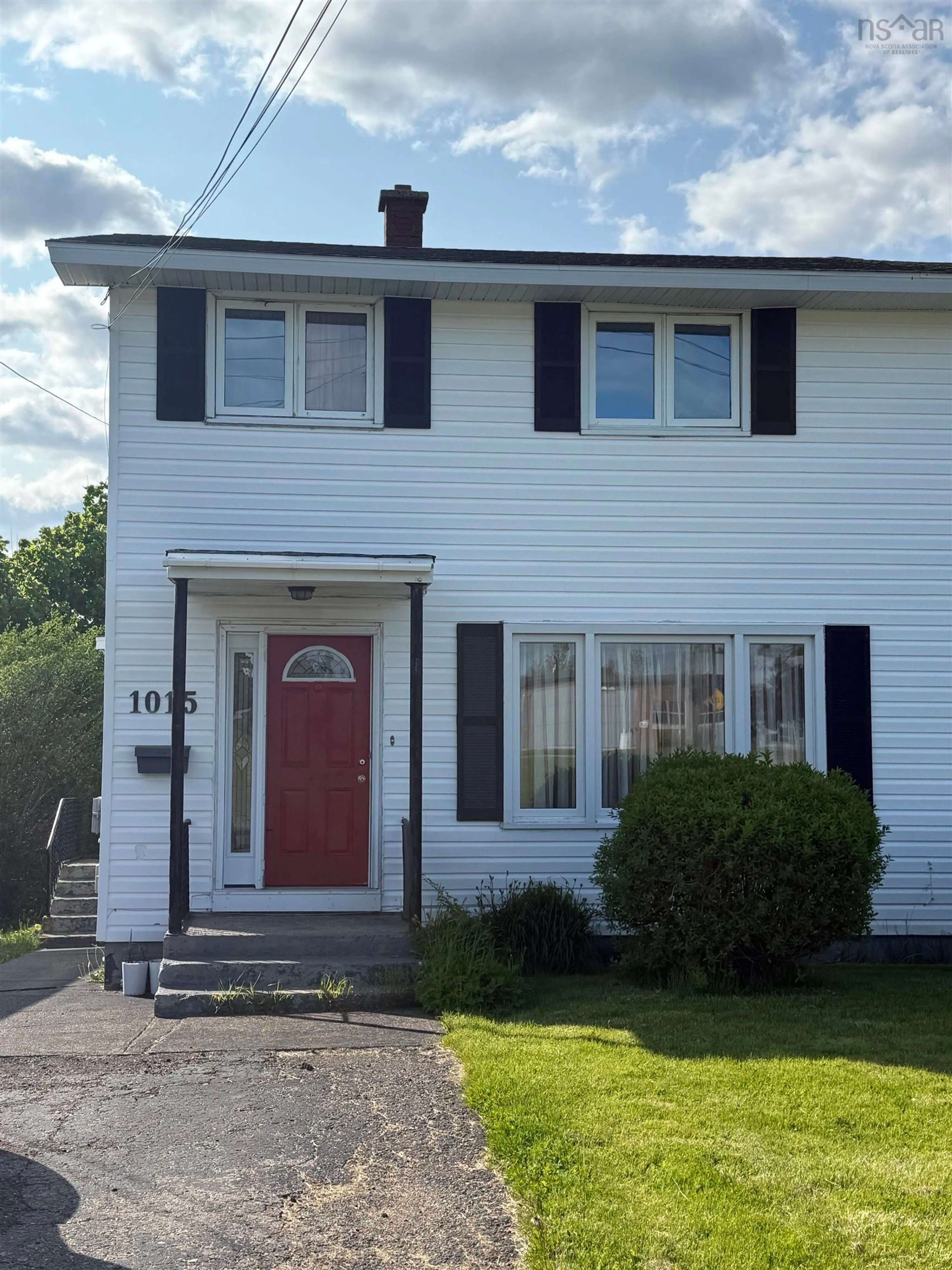 Home with vinyl exterior material, street for 1015 Upper Prince St, Sydney Nova Scotia B1P 5P3