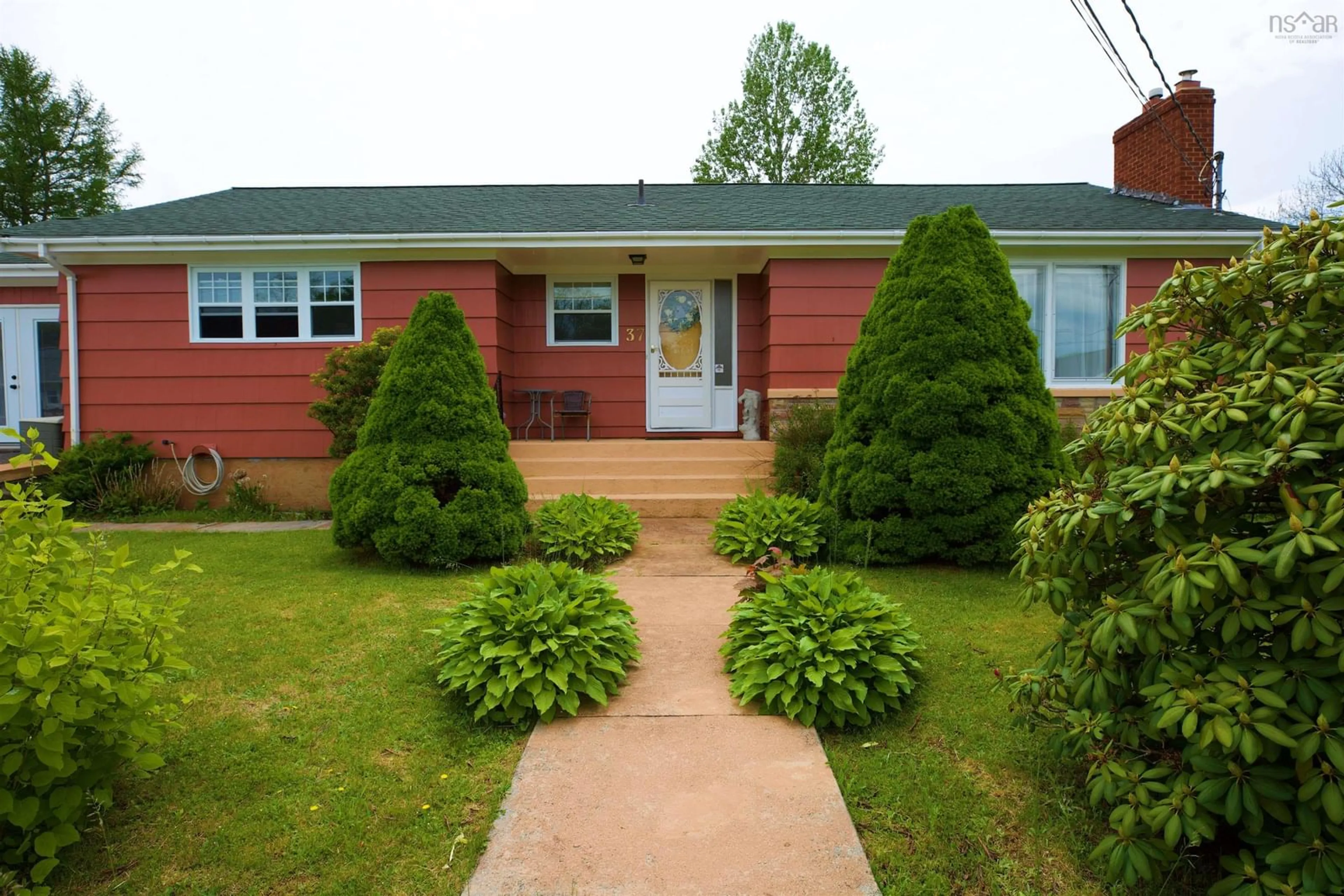 Home with vinyl exterior material, street for 37 Millard Ave, Liverpool Nova Scotia B0T 1K0