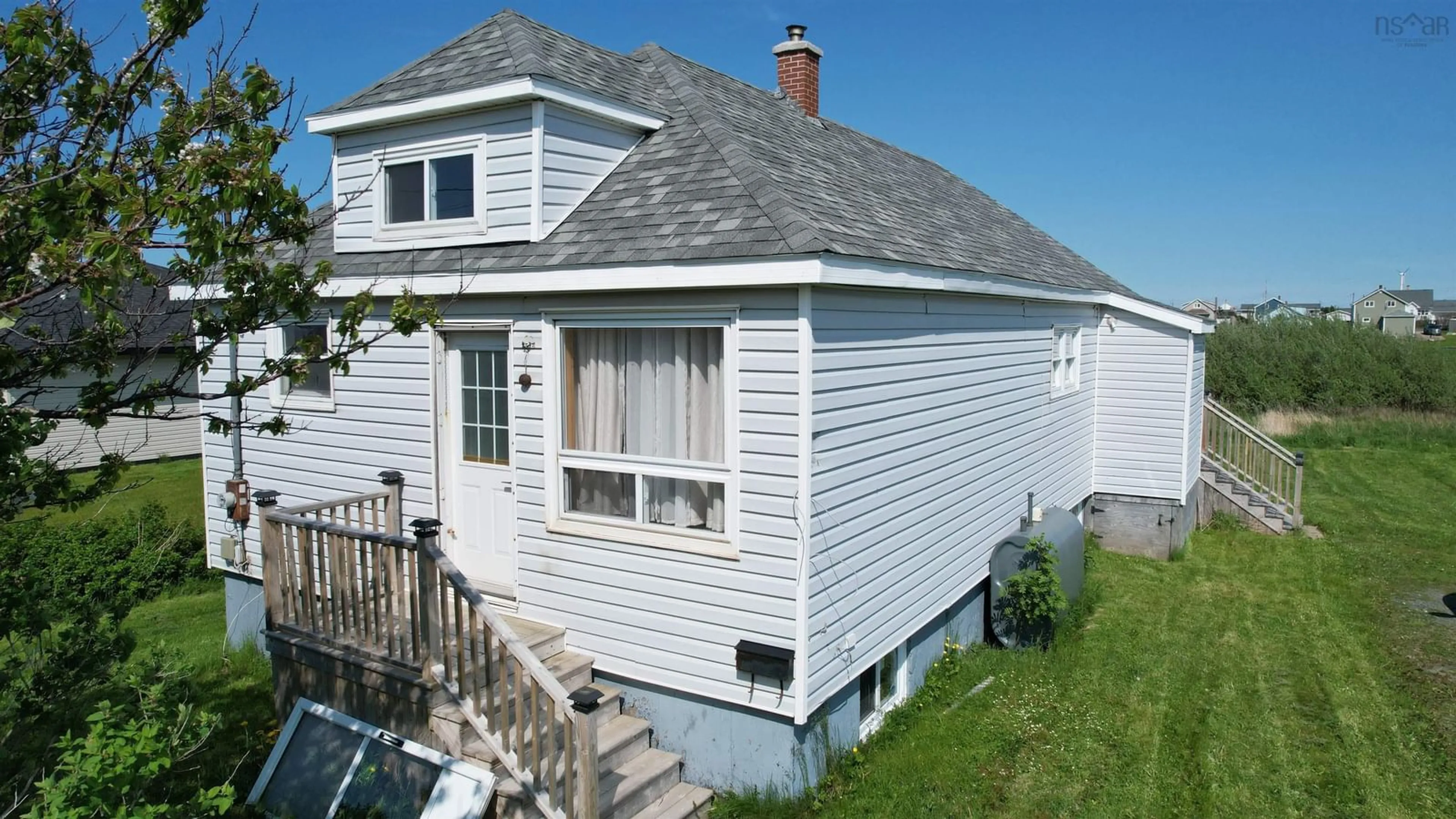 Home with vinyl exterior material, street for 18 Denver St, Glace Bay Nova Scotia B1A 4P8