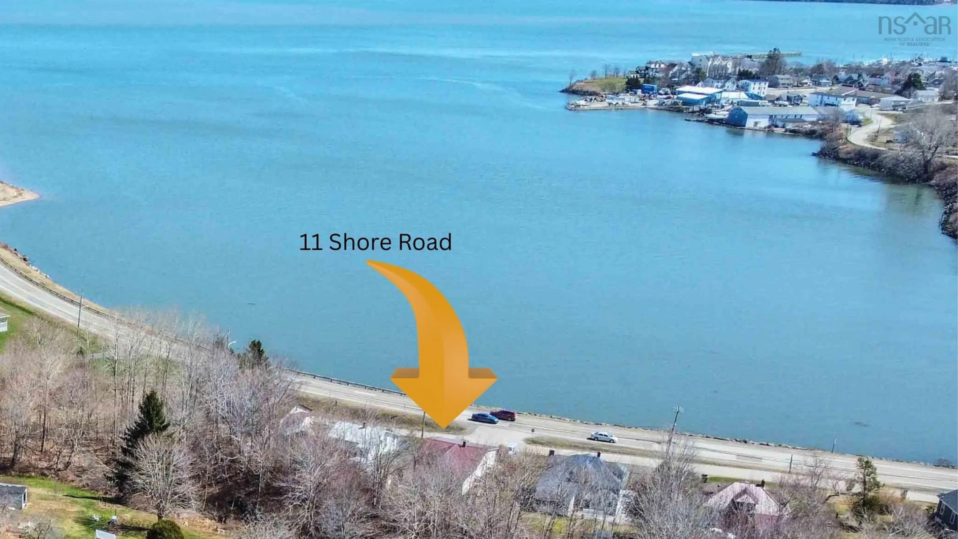 A pic from outside/outdoor area/front of a property/back of a property/a pic from drone, water/lake/river/ocean view for 11 Shore Rd, Digby Nova Scotia B0V 1A0