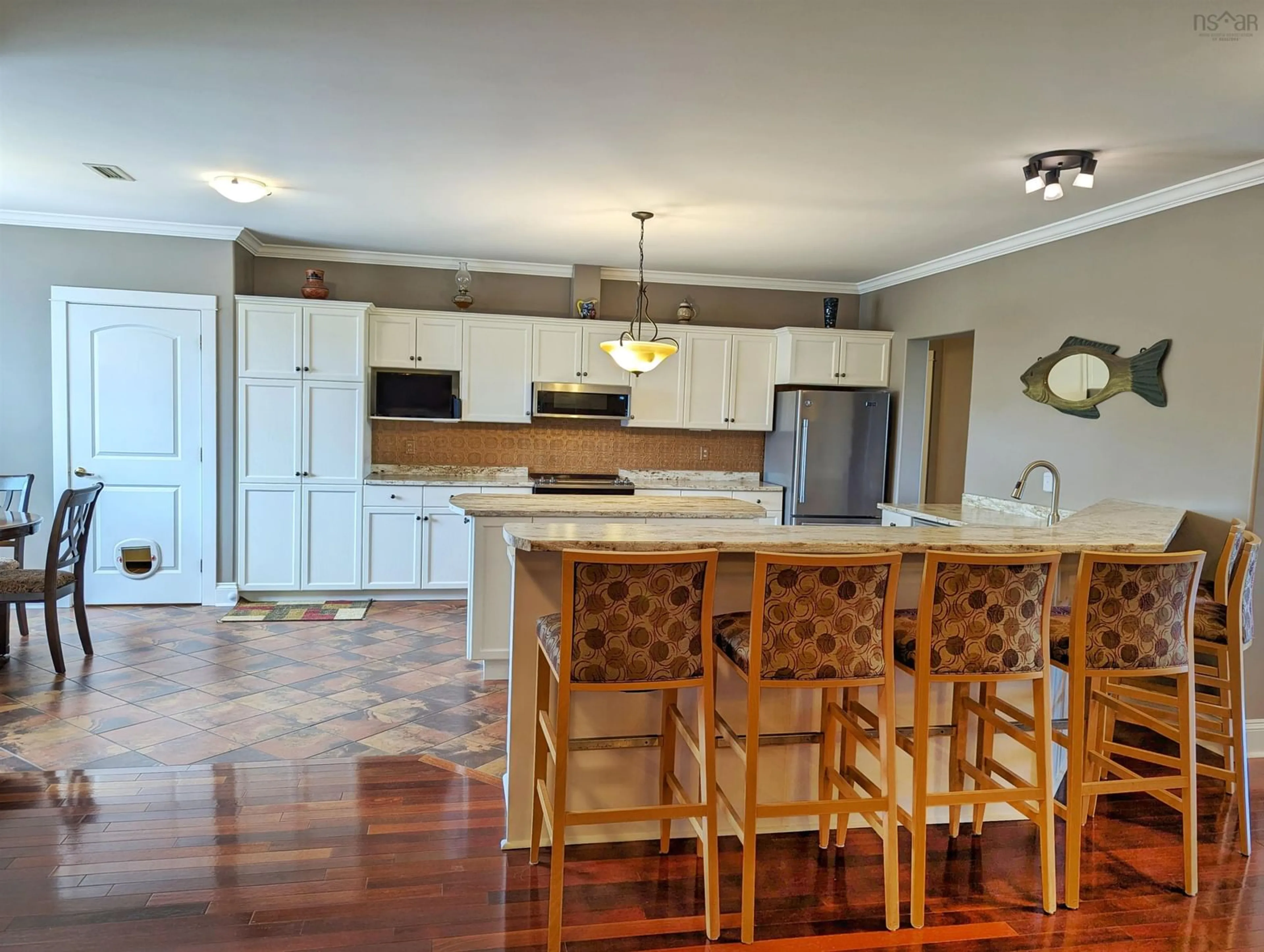 Open concept kitchen, ceramic/tile floor for 42 Bigelow St #302, Wolfville Nova Scotia B4P 0A4