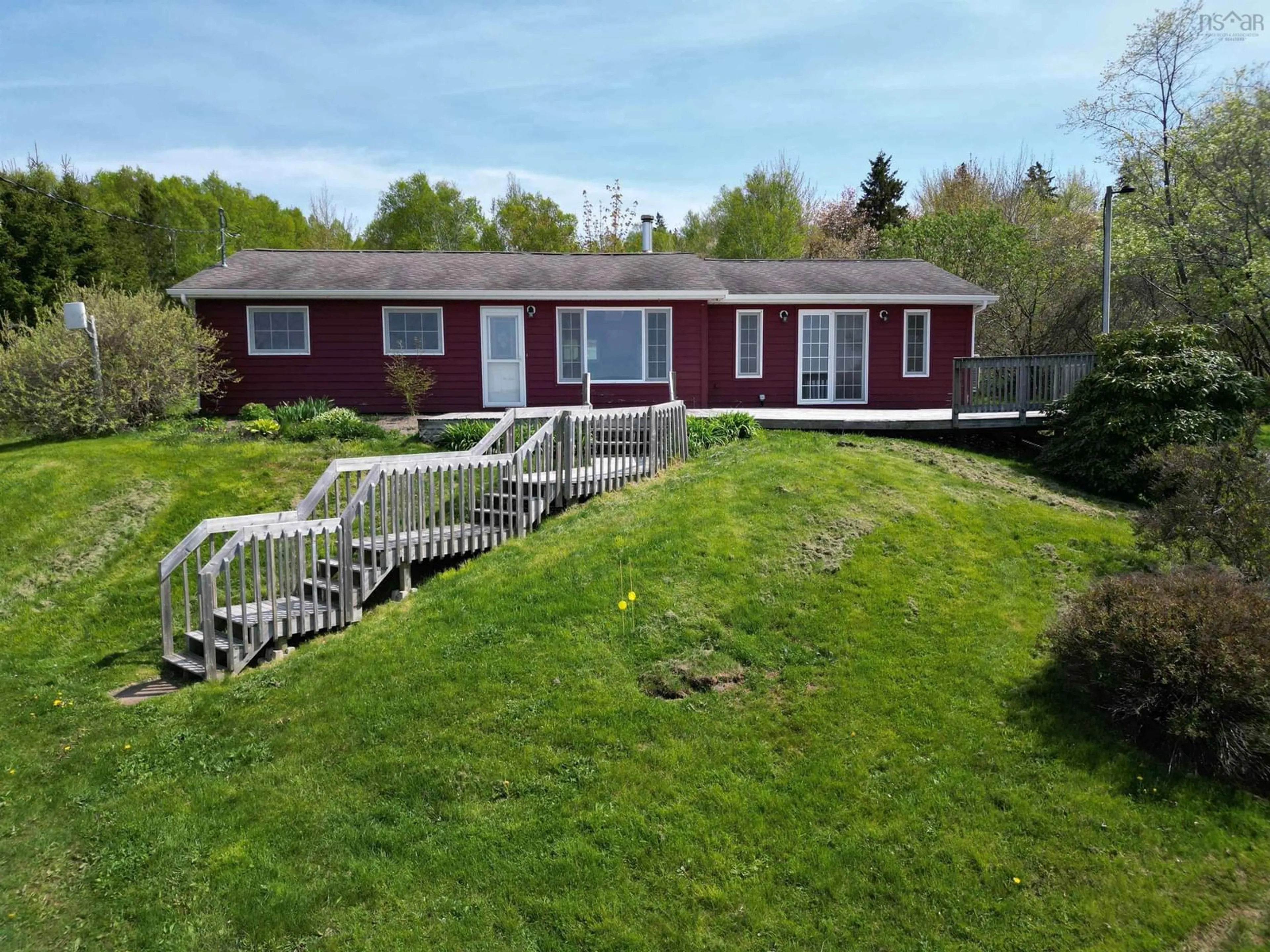 A pic from outside/outdoor area/front of a property/back of a property/a pic from drone, water/lake/river/ocean view for 6783 Grand Narrows Highway, Shenacadie Nova Scotia B1T 1M6