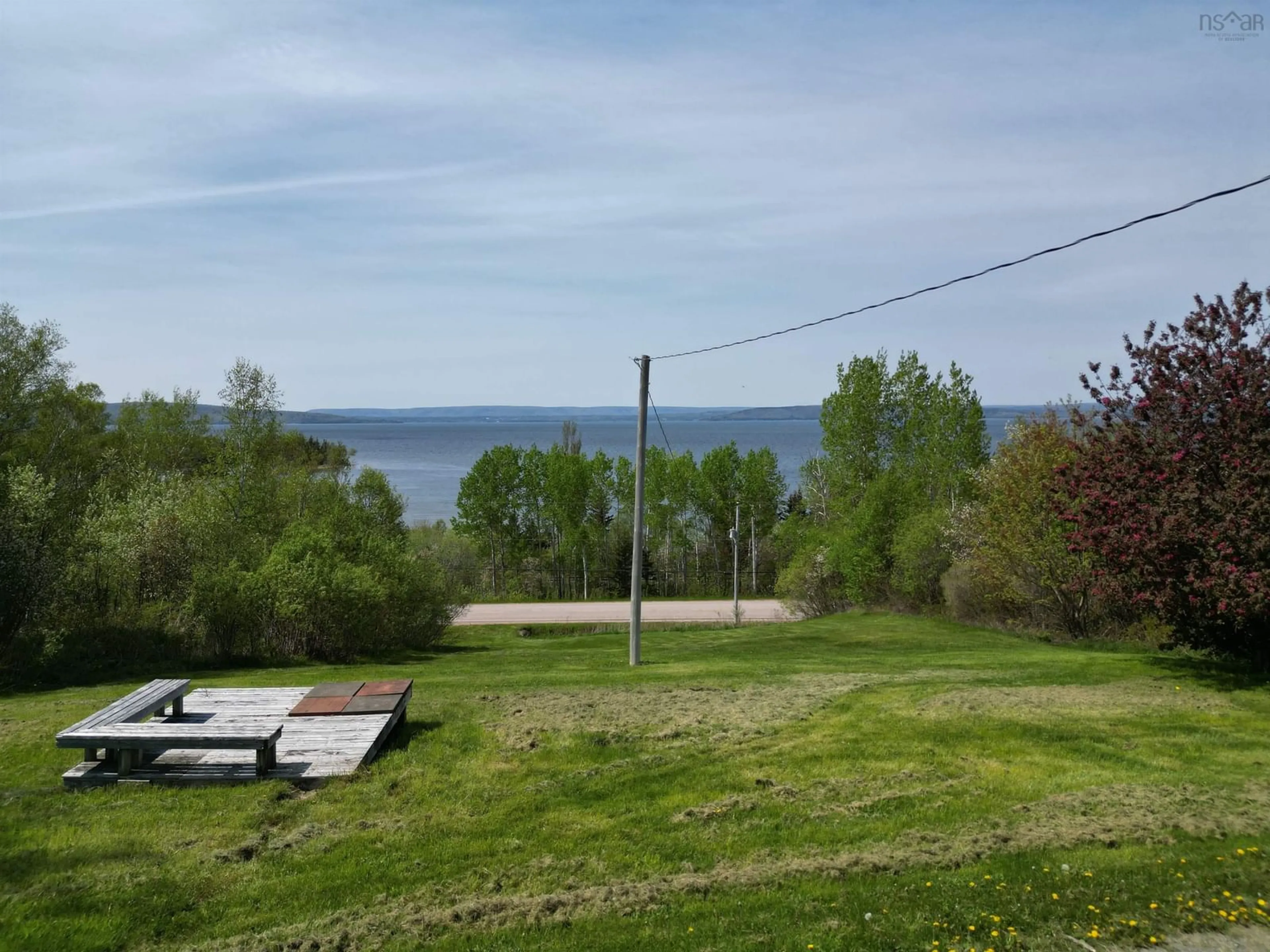 A pic from outside/outdoor area/front of a property/back of a property/a pic from drone, water/lake/river/ocean view for 6783 Grand Narrows Highway, Shenacadie Nova Scotia B1T 1M6