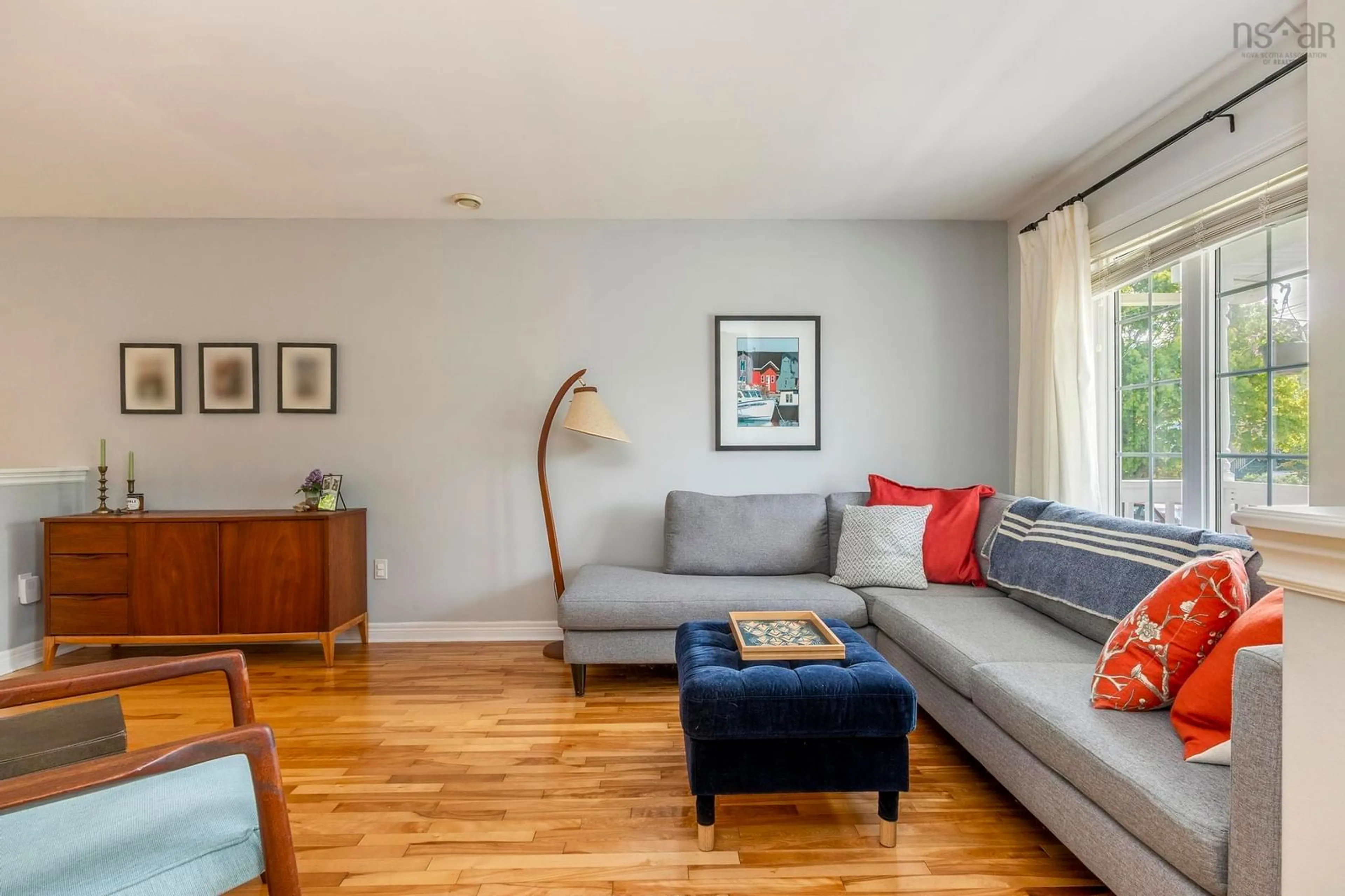 Living room with furniture, wood/laminate floor for 66 Theakston Ave, Halifax Nova Scotia B3P 2S8