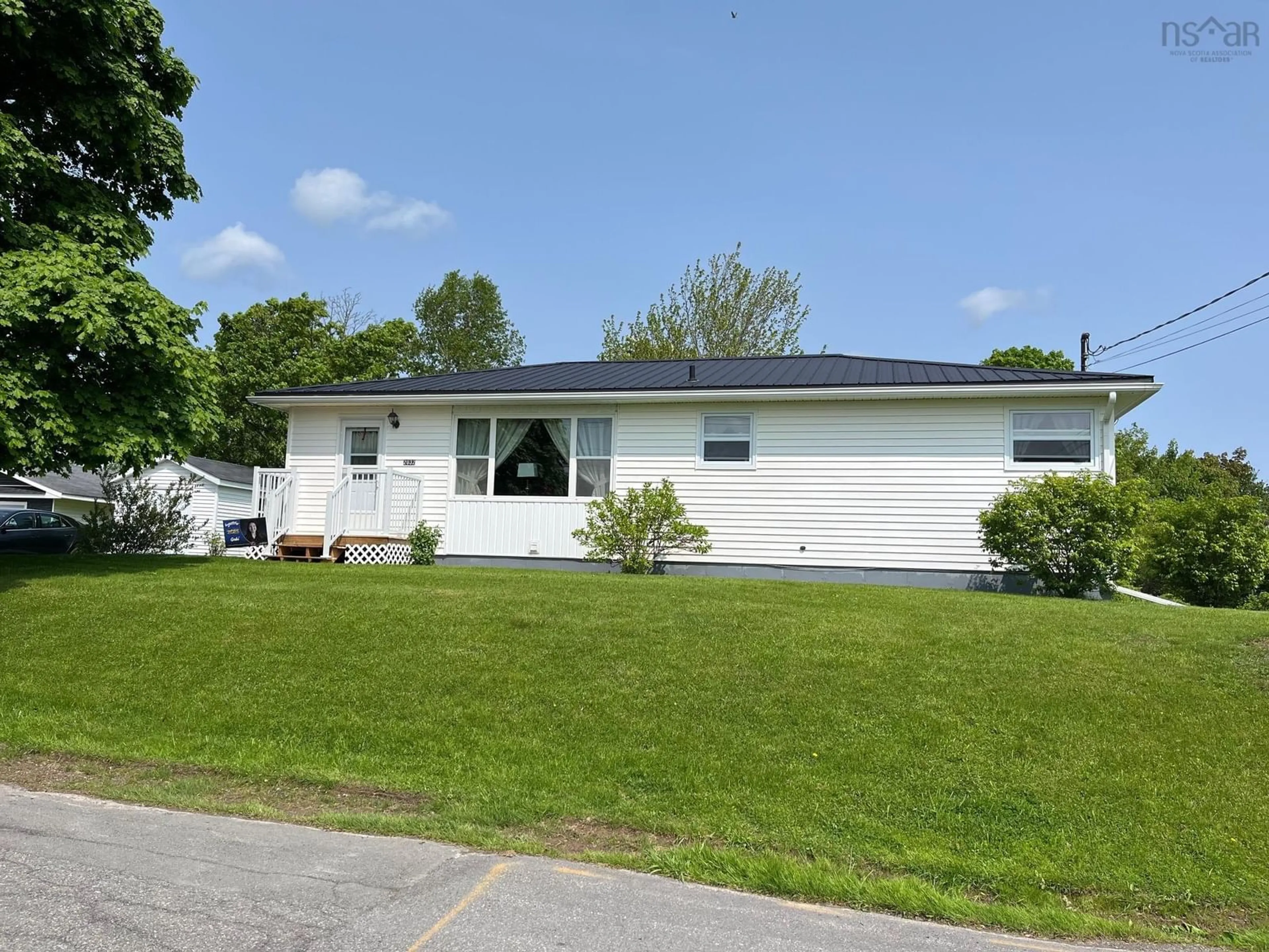 Home with vinyl exterior material, street for 2032 Prince Albert St, Westville Nova Scotia B0K 2A0
