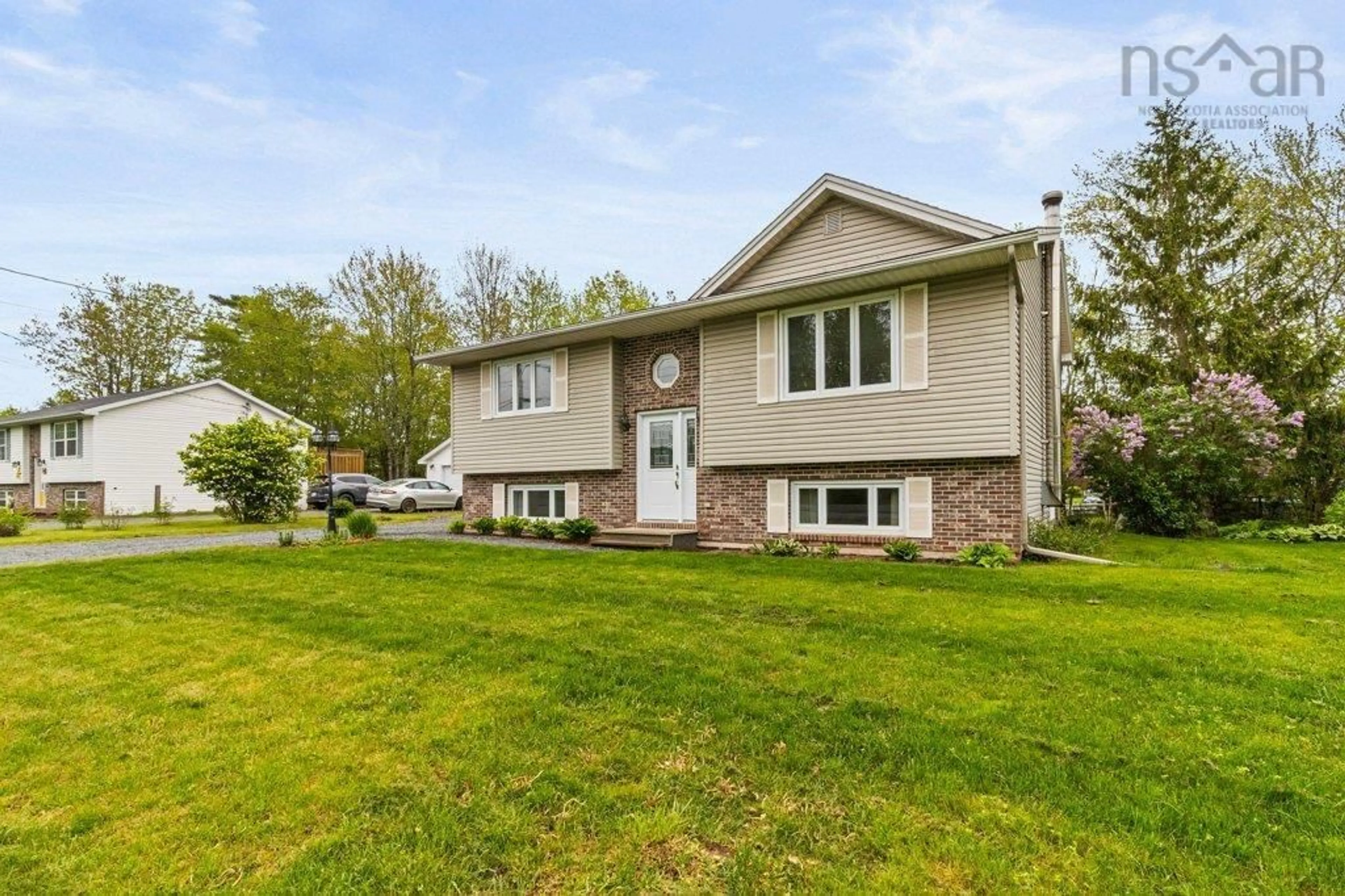 Home with vinyl exterior material, street for 63 Tannery Dr, Elmsdale Nova Scotia B2S 1C6