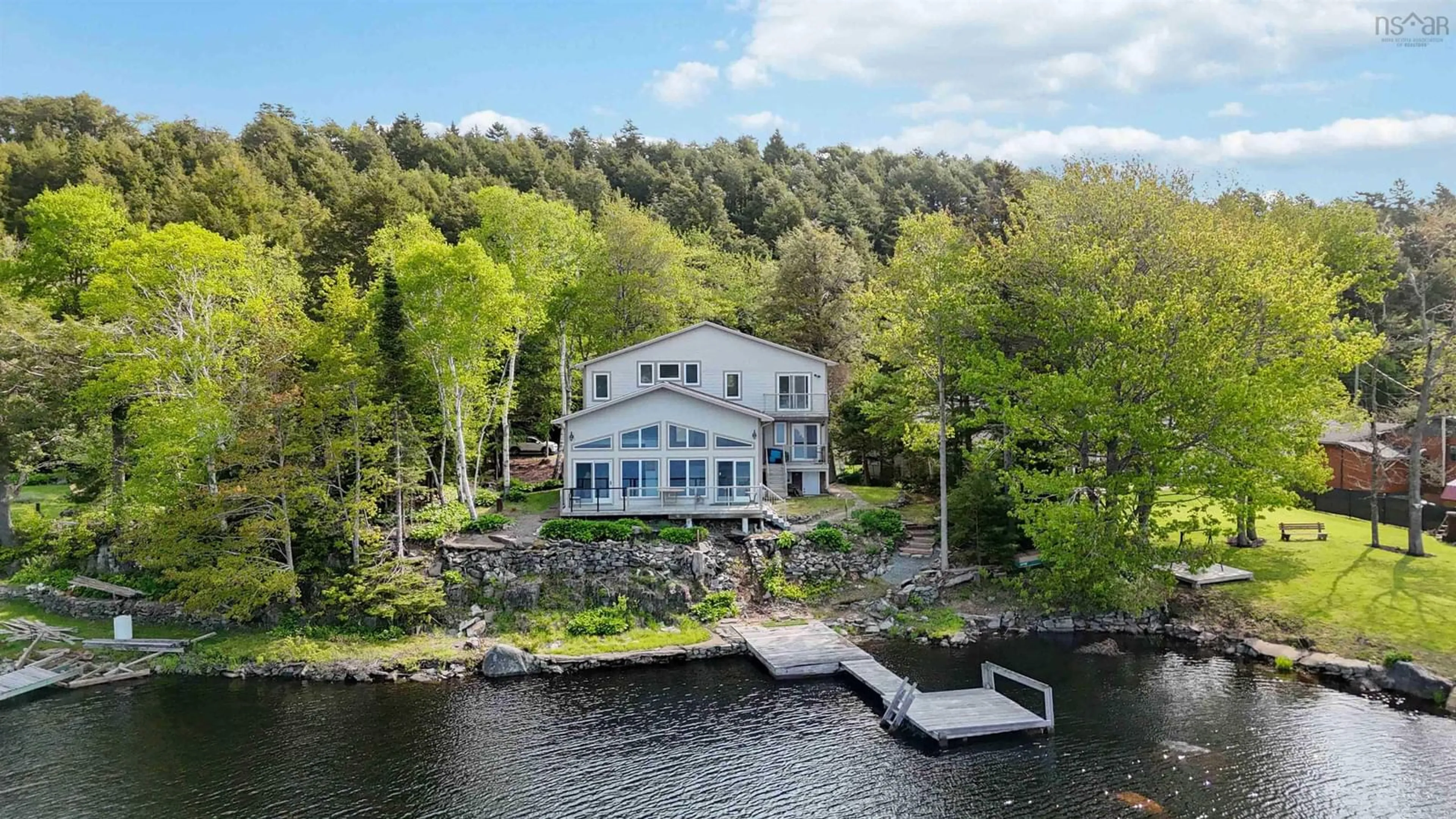 A pic from outside/outdoor area/front of a property/back of a property/a pic from drone, water/lake/river/ocean view for 117 River Dr, Lake Echo Nova Scotia B3E 1C8