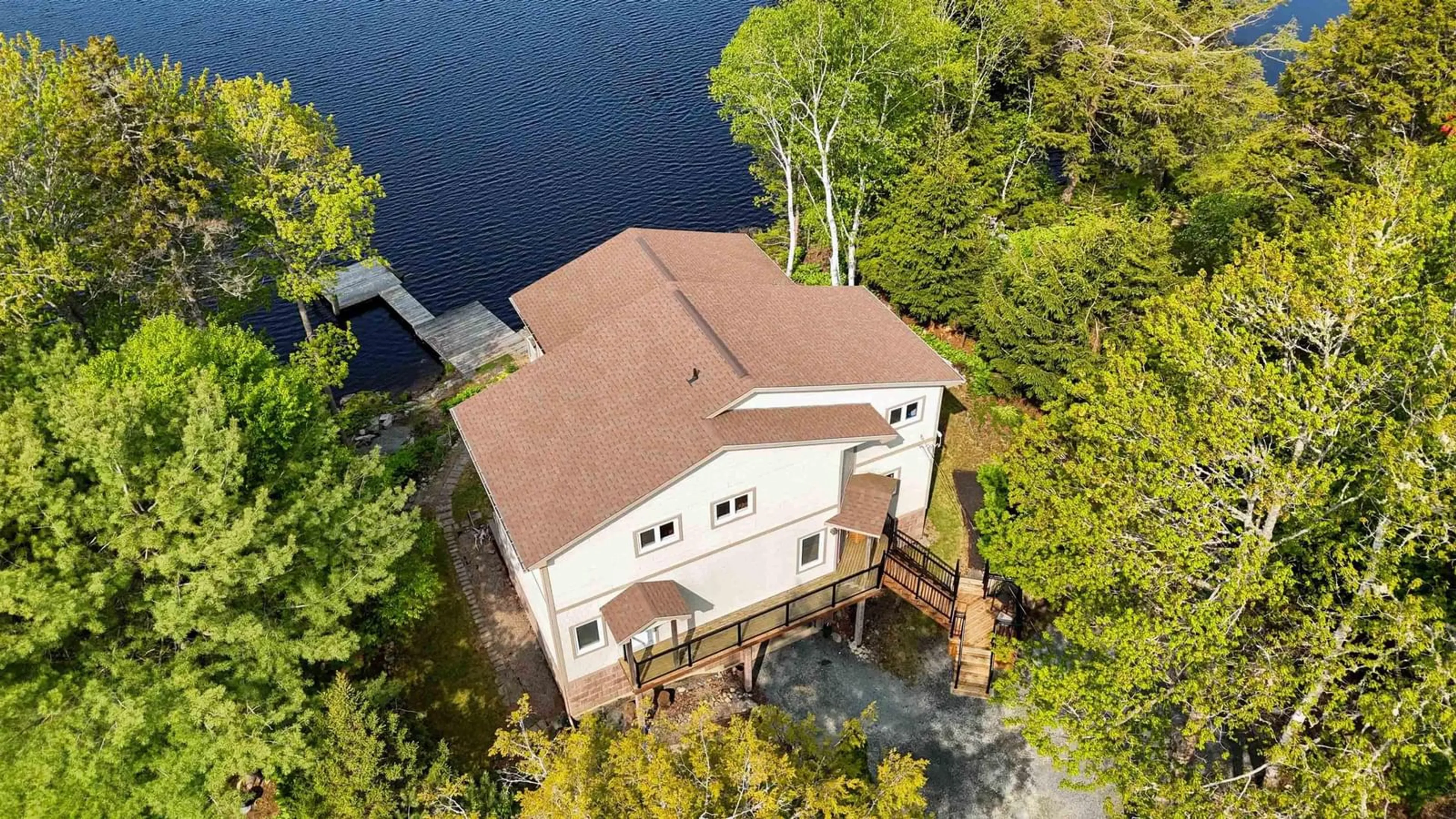 A pic from outside/outdoor area/front of a property/back of a property/a pic from drone, water/lake/river/ocean view for 117 River Dr, Lake Echo Nova Scotia B3E 1C8