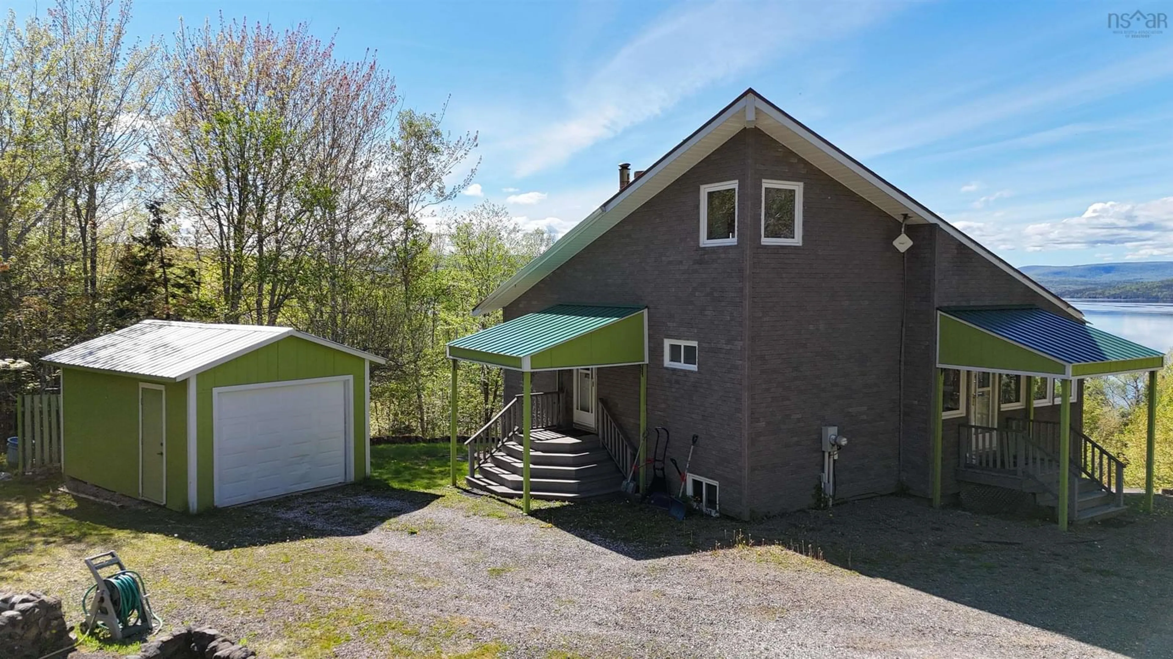 A pic from outside/outdoor area/front of a property/back of a property/a pic from drone, building for 55 312 Hwy, Englishtown Nova Scotia B0C 1H0