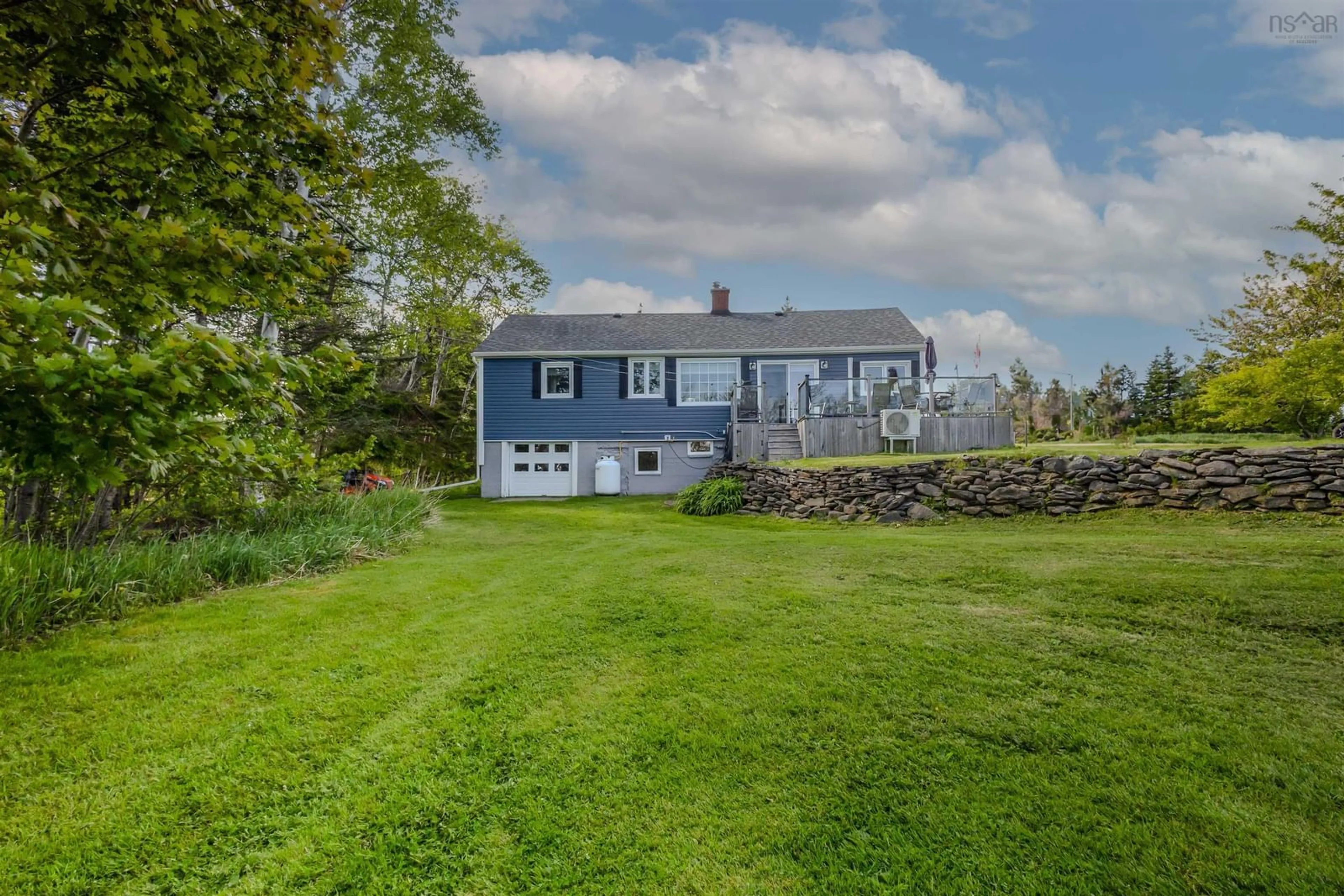 A pic from outside/outdoor area/front of a property/back of a property/a pic from drone, water/lake/river/ocean view for 475 Hillside Road, Mira Albert Bridge Nova Scotia B1K 3H9