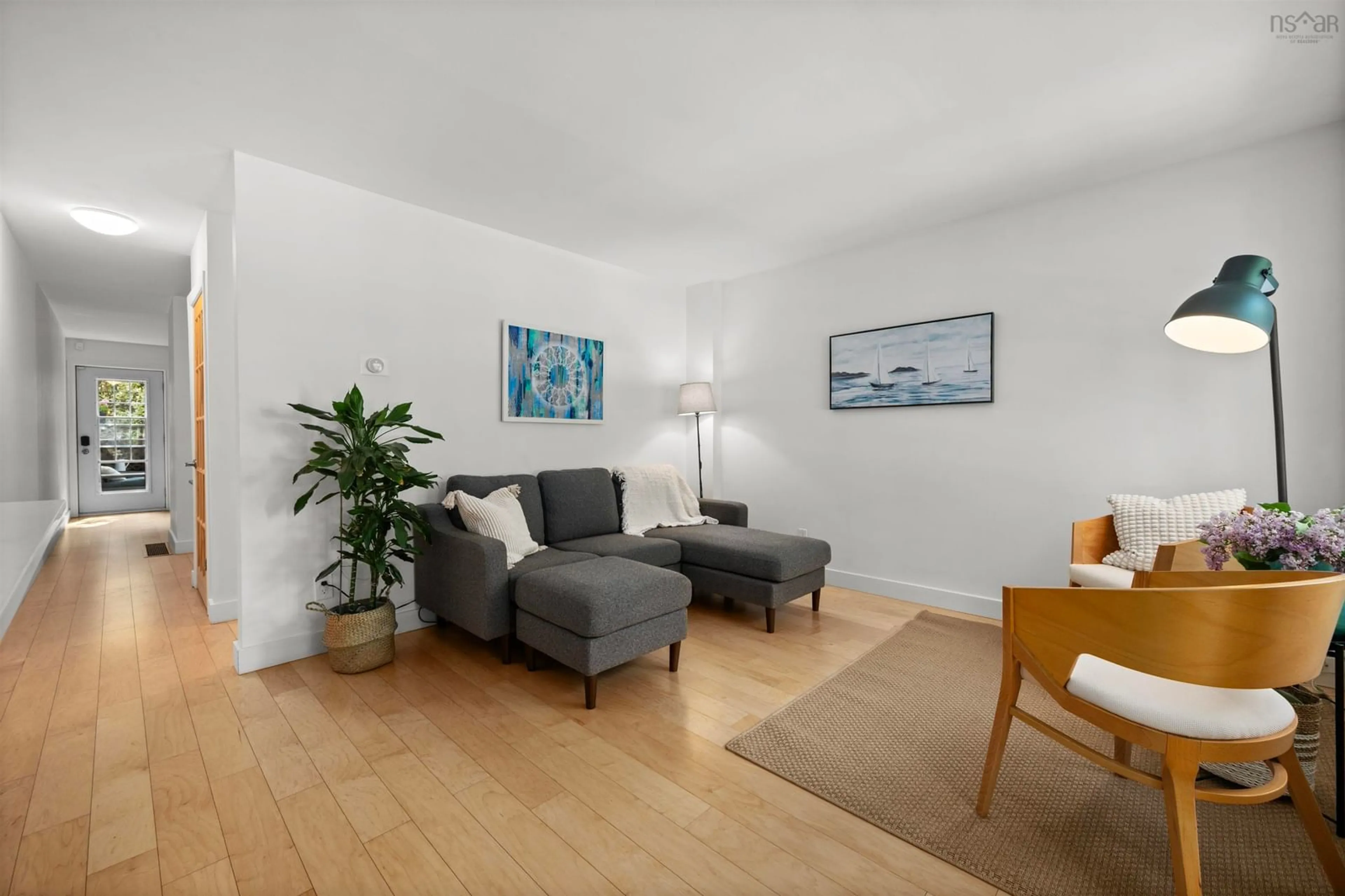 Living room with furniture, wood/laminate floor for 2578 Brunswick St, Halifax Nova Scotia B3K 2Z6