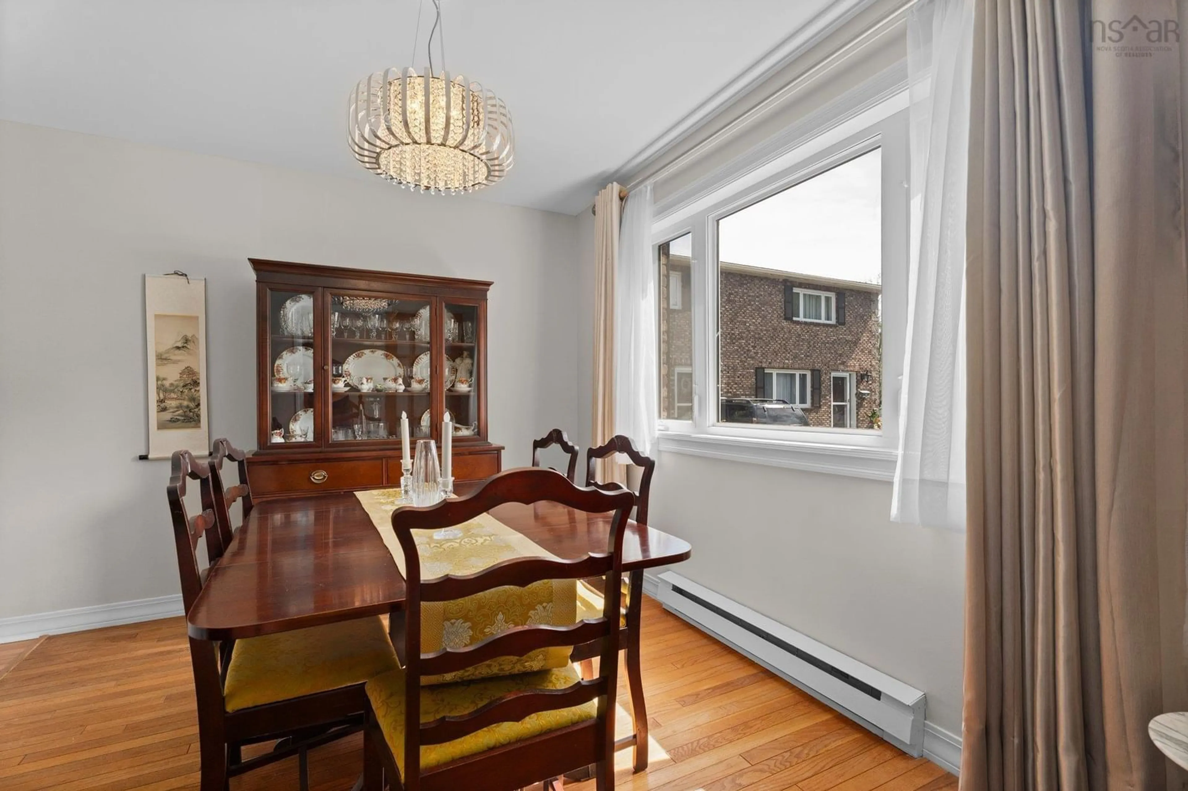 Dining room, wood/laminate floor for 12 Pioneer Ave, Halifax Nova Scotia B3M 1W8