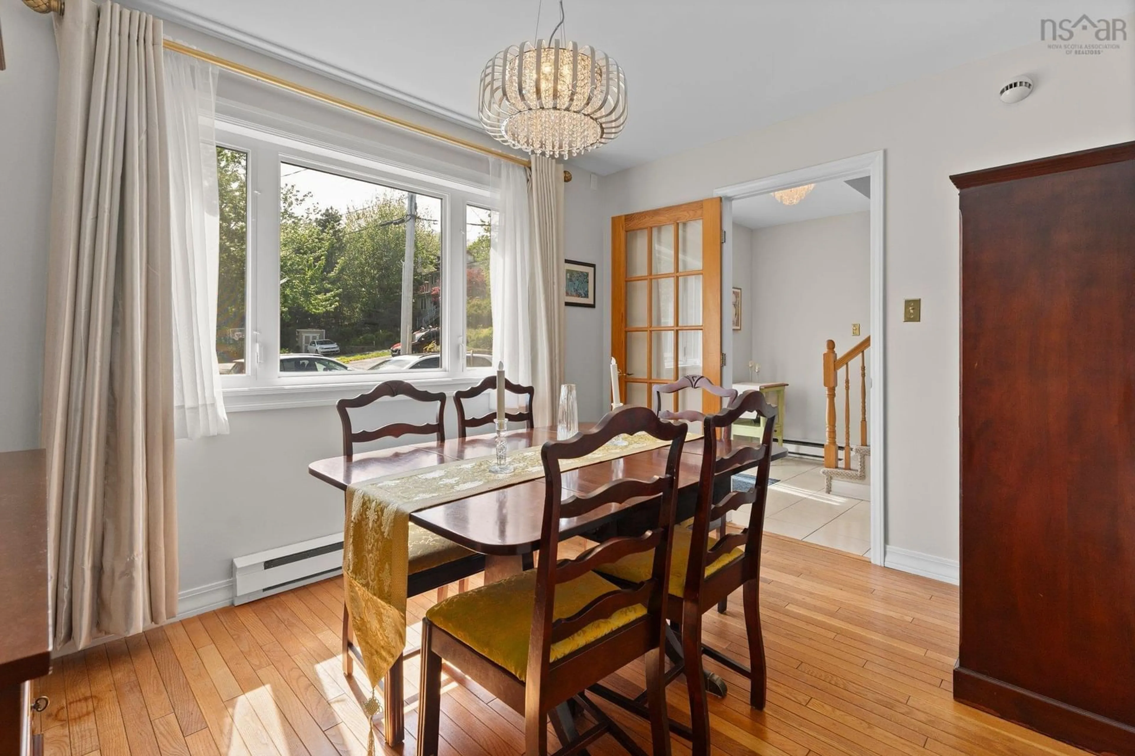 Dining room, wood/laminate floor for 12 Pioneer Ave, Halifax Nova Scotia B3M 1W8