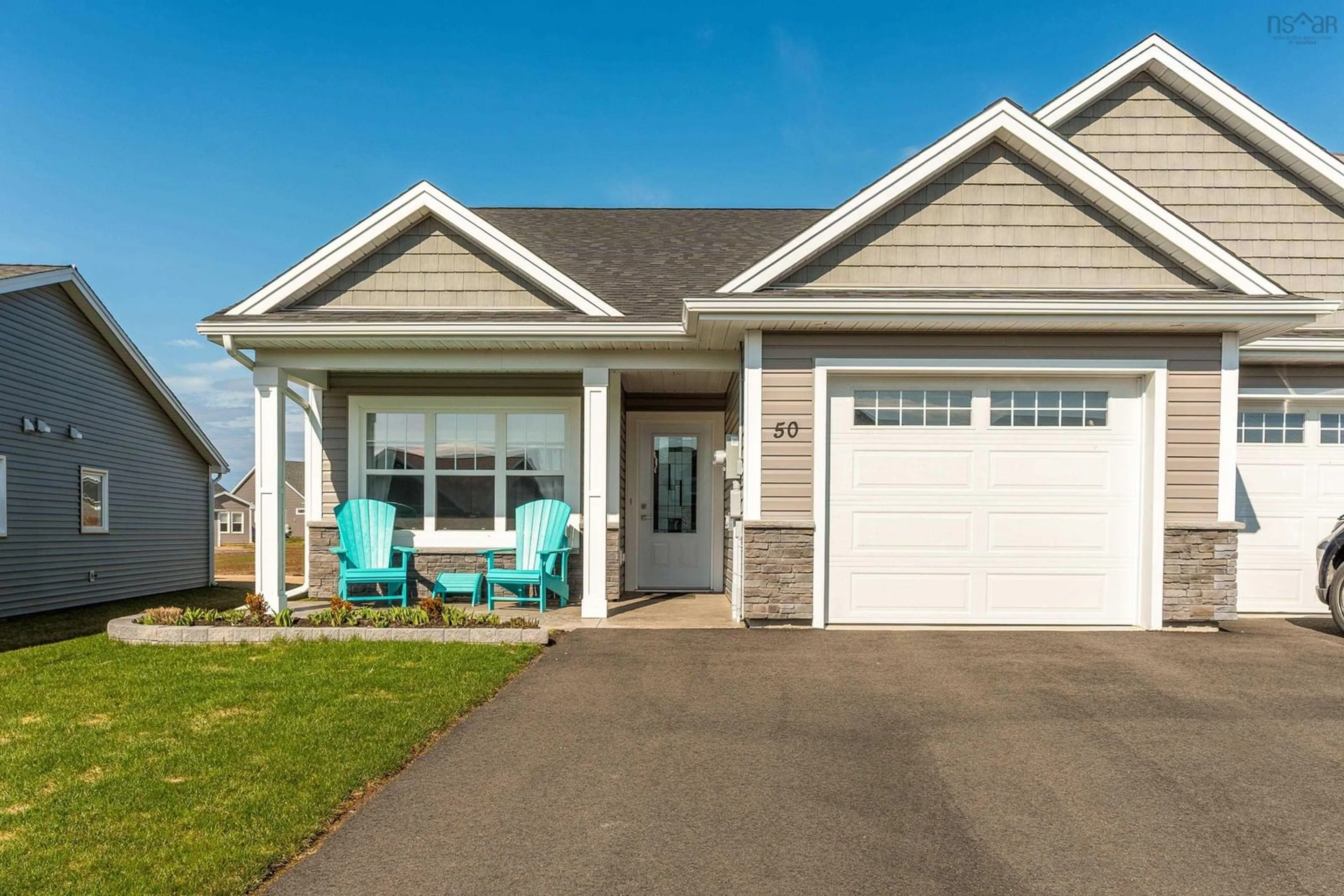 Home with vinyl exterior material, street for 50 Elizabeth Ave, Garlands Crossing Nova Scotia B0N 2T0